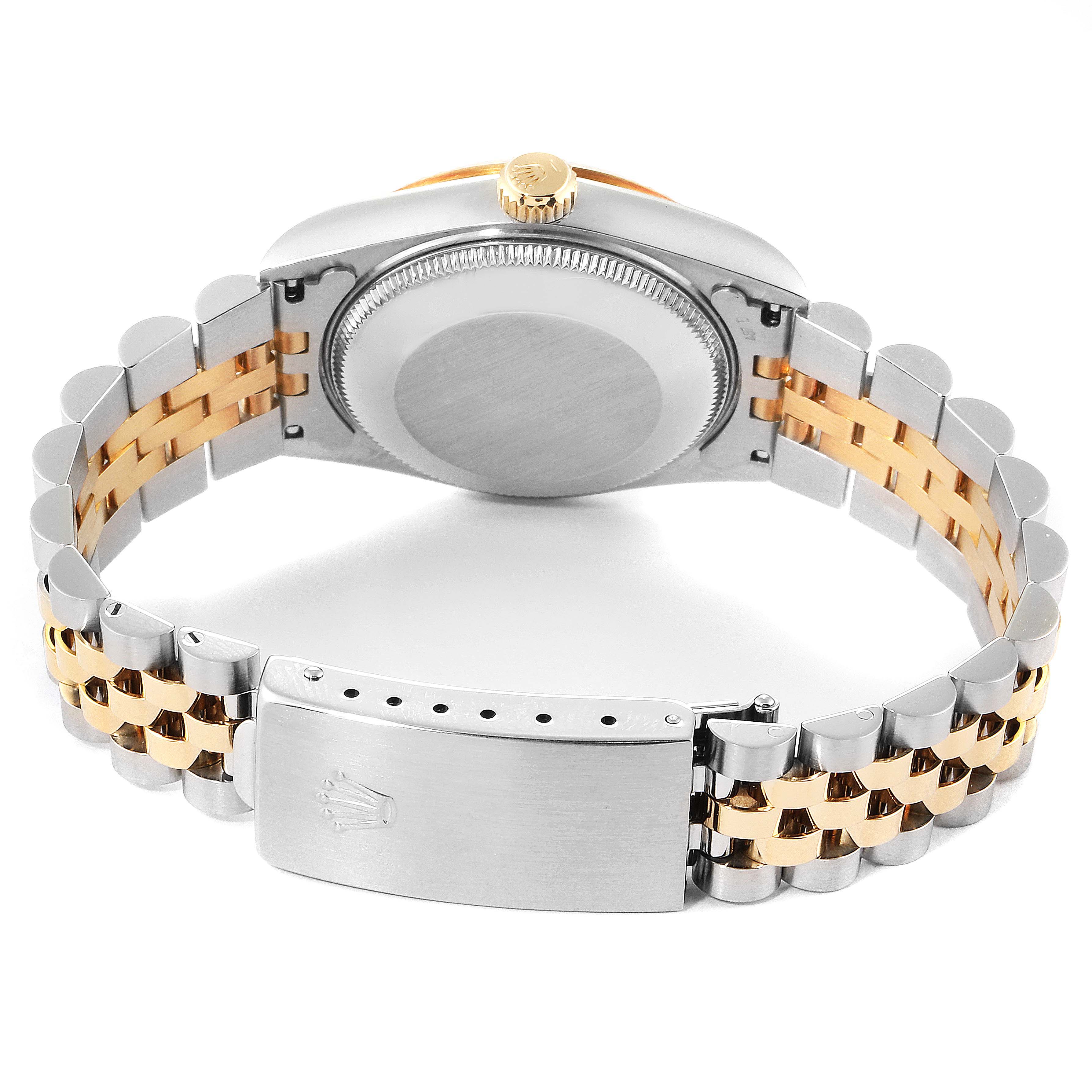 The image shows the back view, bracelet, and clasp of a Rolex Mid-Size 68273 Women
s Steel and Gold (two tone) Champagne Dial 68273 Women
s Steel and Gold (two tone) Champagne Dial watch.