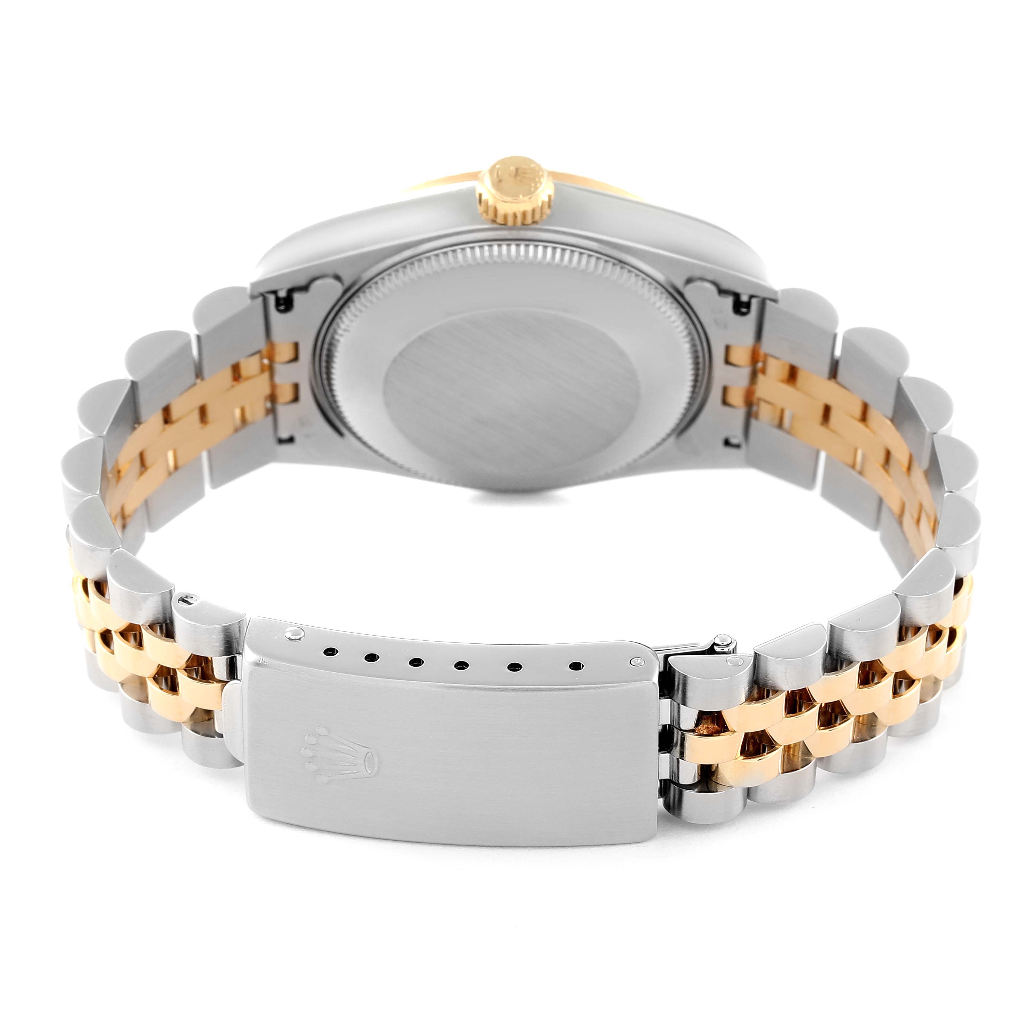 This image shows the back of the Rolex Mid-Size 68273 Women's Steel and Gold (two tone) White Dial 68273 Women's Steel and Gold (two tone) White Dial watch including the case back, crown, and dual-tone bracelet with the clasp.