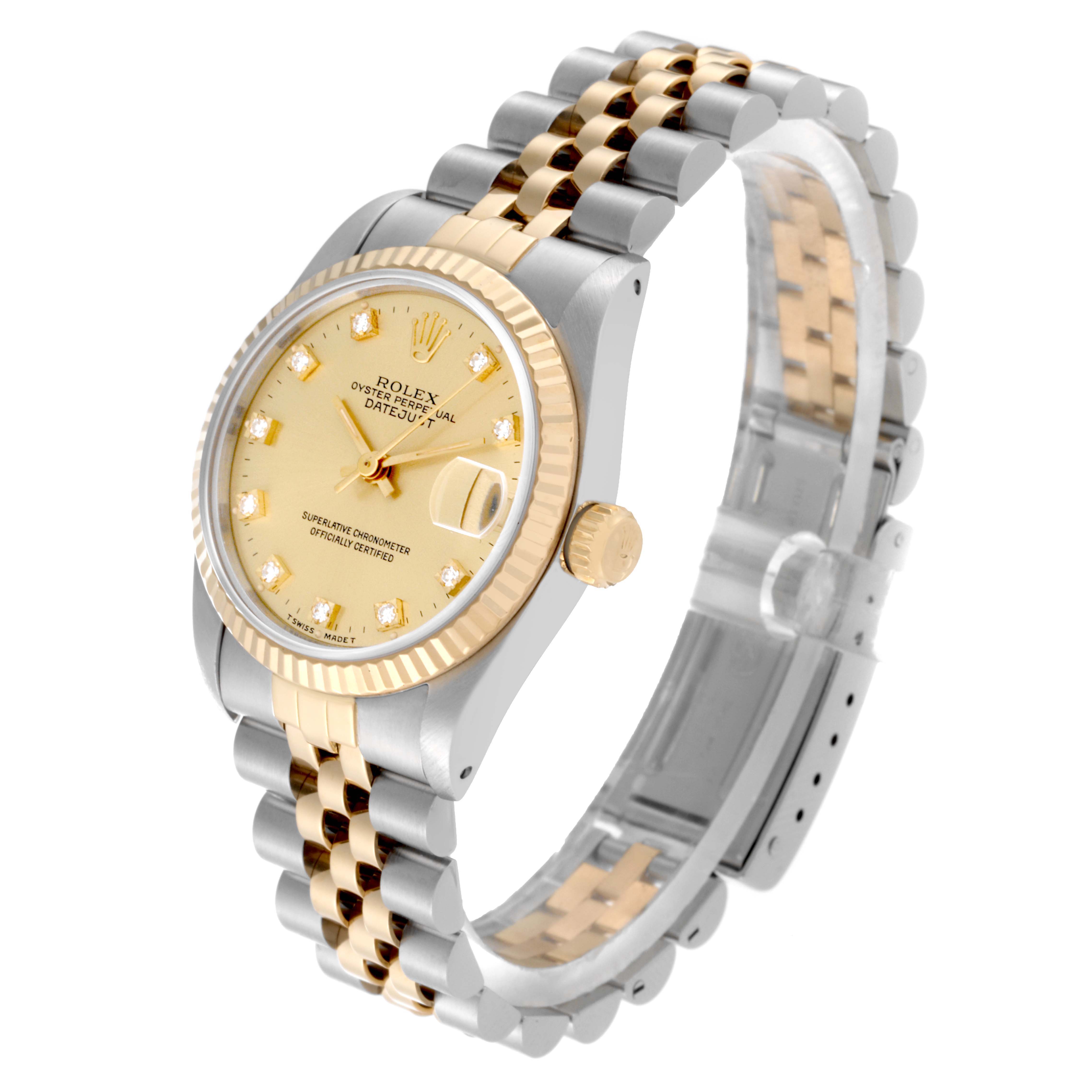 The image shows a Rolex Mid-Size 68273 Women's Steel and Gold (two tone) Champagne Dial 68273 Women's Steel and Gold (two tone) Champagne Dial watch, angled to display the face, bezel, crown, and partial bracelet.