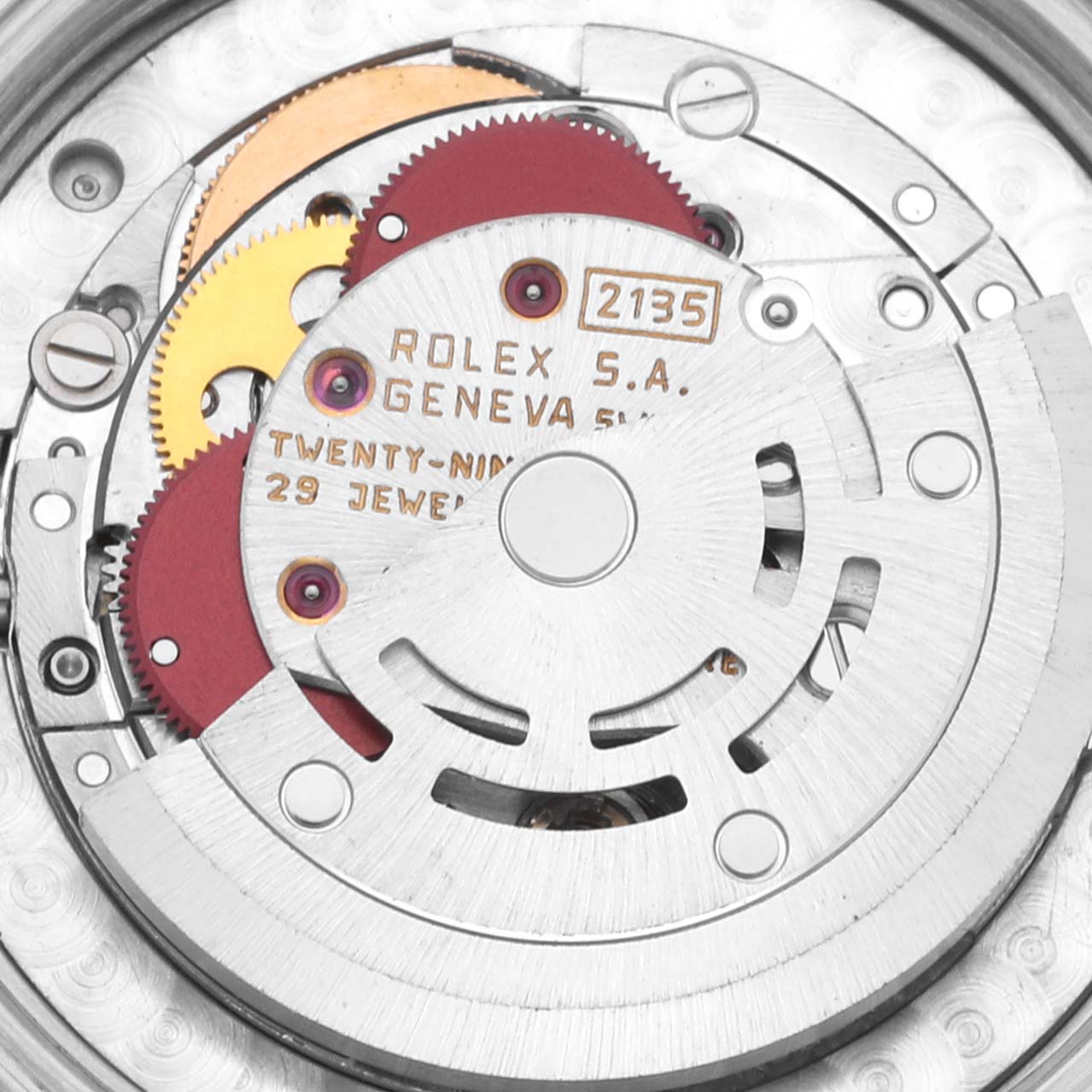 This image shows a close-up view of the movement mechanism of a Rolex Mid-Size 68273 Women's Steel and Gold (two tone) Champagne Dial 68273 Women's Steel and Gold (two tone) Champagne Dial model watch, specifically the rotor and gears.
