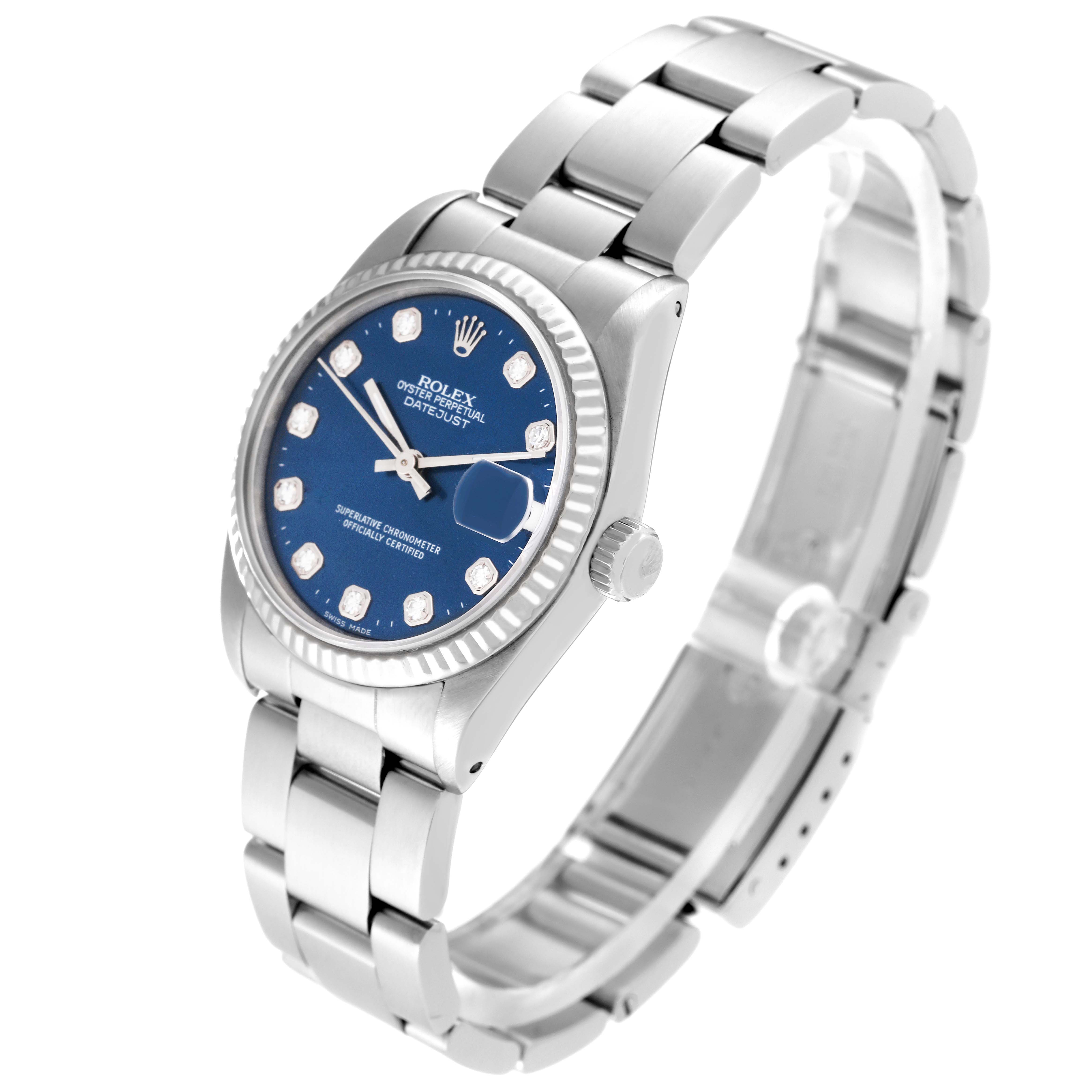 The Rolex Mid-Size 68274 Women's Stainless Steel Blue Dial 68274 Women's Stainless Steel Blue Dial watch is shown at an angled view, displaying its blue dial, bezel, crown, and stainless steel bracelet.