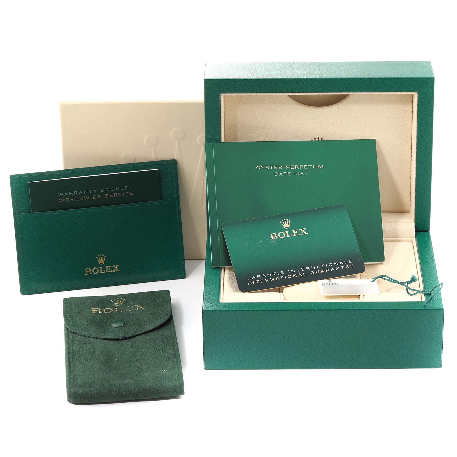 The image shows the packaging, warranty booklet, guarantee card, and accessories for a Mid-Size Rolex watch from a front angle.