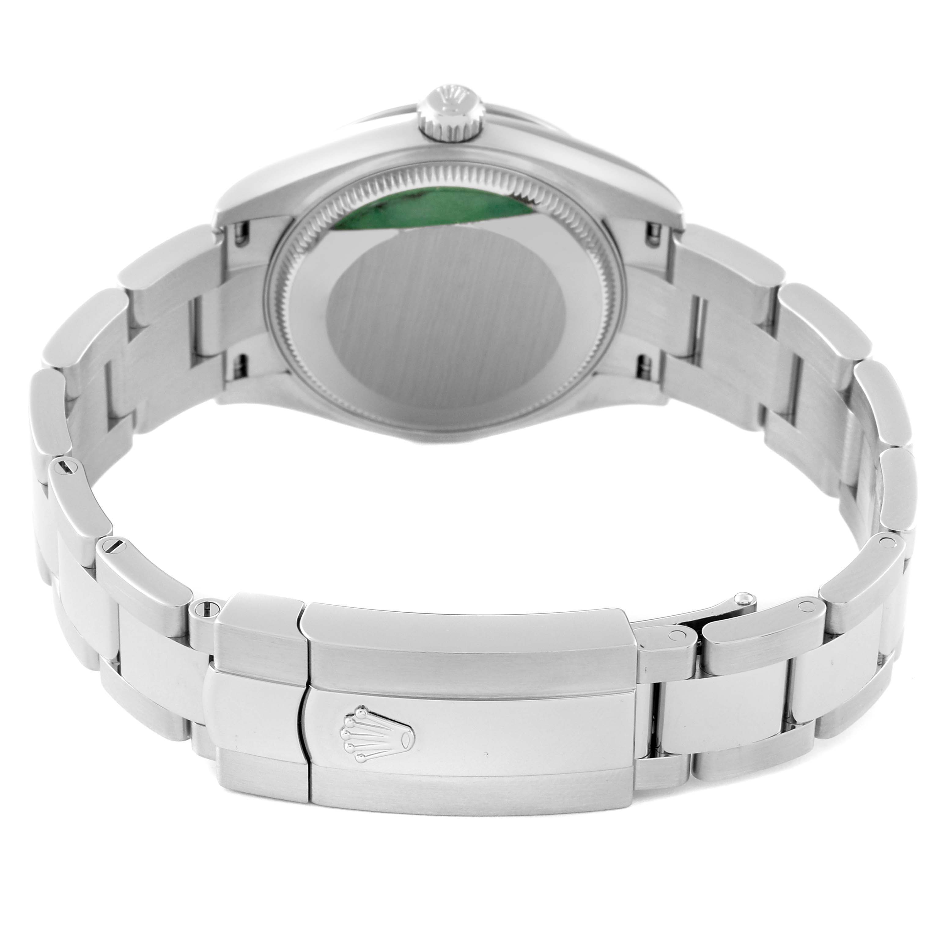 This image shows the back case and bracelet clasp of a Mid-Size Rolex watch.