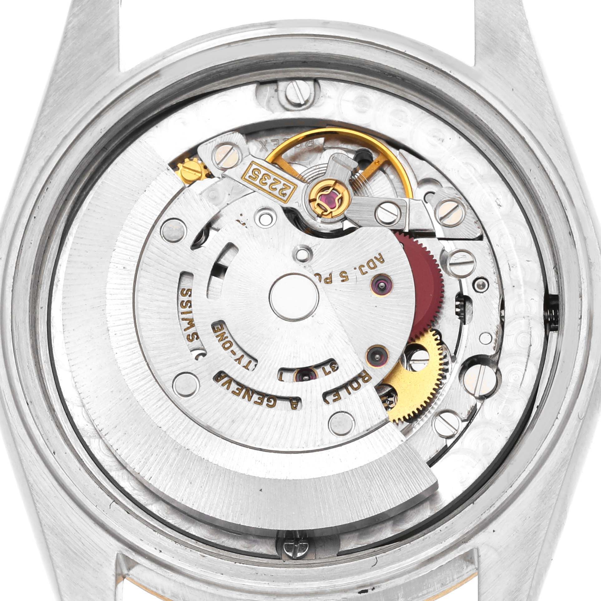 The image shows a close-up of the internal mechanism of a Rolex Mid-Size 78273 Women's Steel and Gold (two tone) Champagne Dial 78273 Women's Steel and Gold (two tone) Champagne Dial watch, revealing the movement and gears.