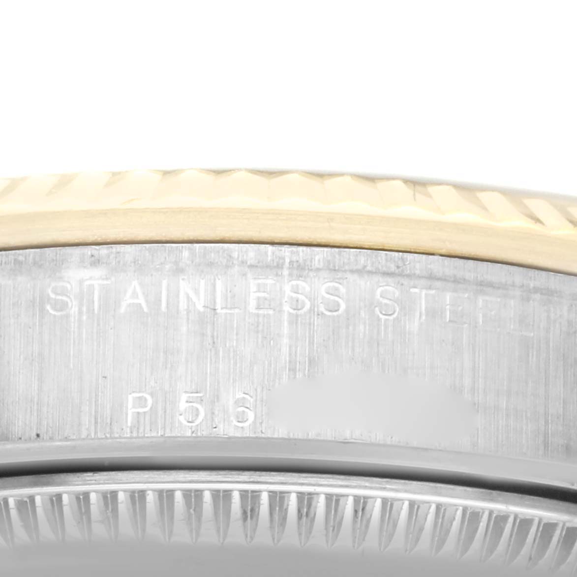 This close-up image shows the side view of a Rolex Mid-Size 78273 Women's Steel and Gold (two tone) Champagne Dial 78273 Women's Steel and Gold (two tone) Champagne Dial watch, focusing on the stainless steel case with part of the bezel visible.