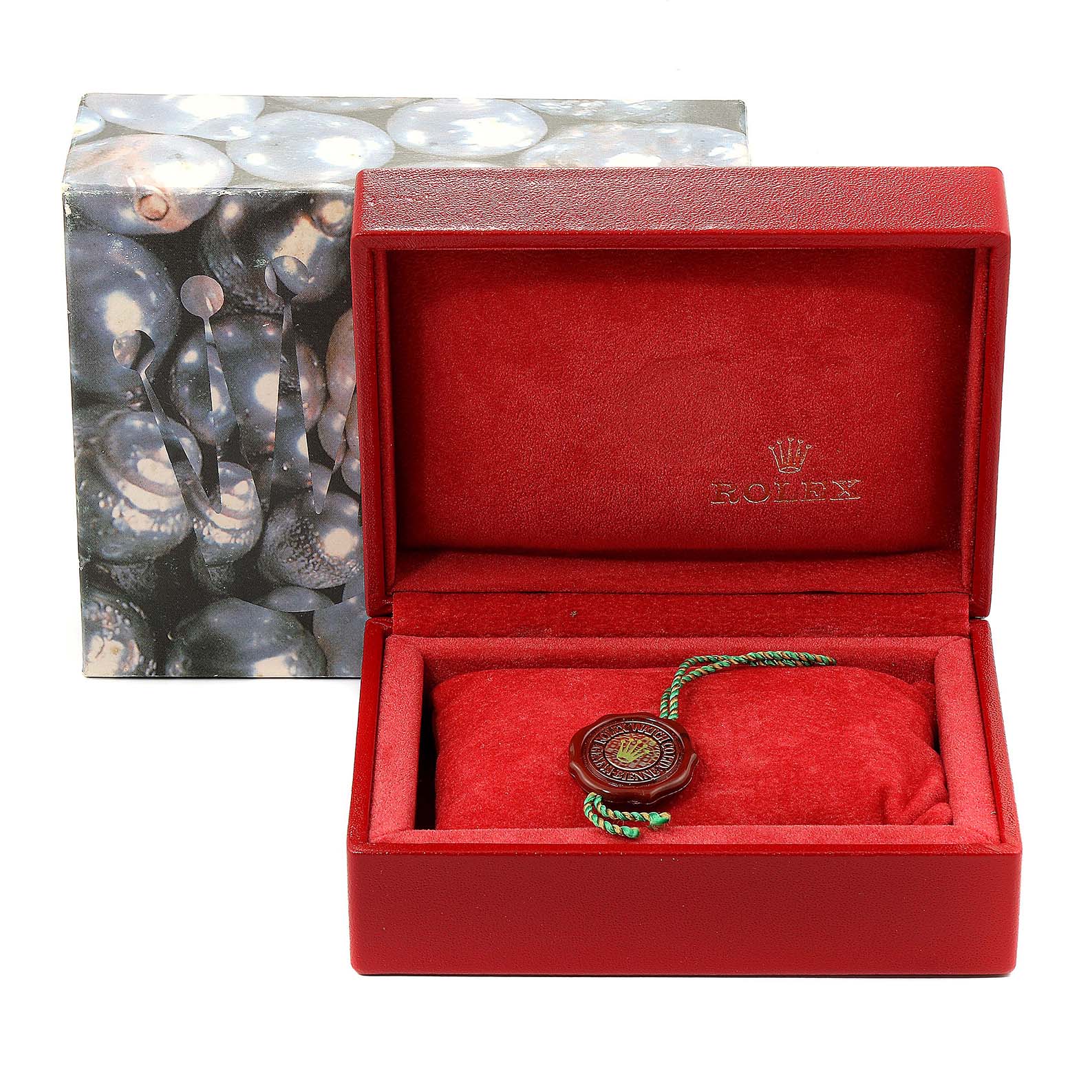 The image shows a Rolex Datejust 69173 Women's Steel and Gold (two tone) Blue Dial 69173 Women's Steel and Gold (two tone) Blue Dial watch box and cushion from a front angle, with a seal tag inside.