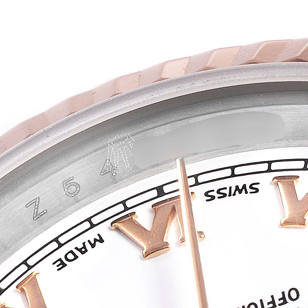 The image shows a close-up of the dial, Roman numeral markers, and part of the bezel of a Rolex Datejust 179171 Women's Steel and Gold (two tone) White Dial 179171 Women's Steel and Gold (two tone) White Dial watch.
