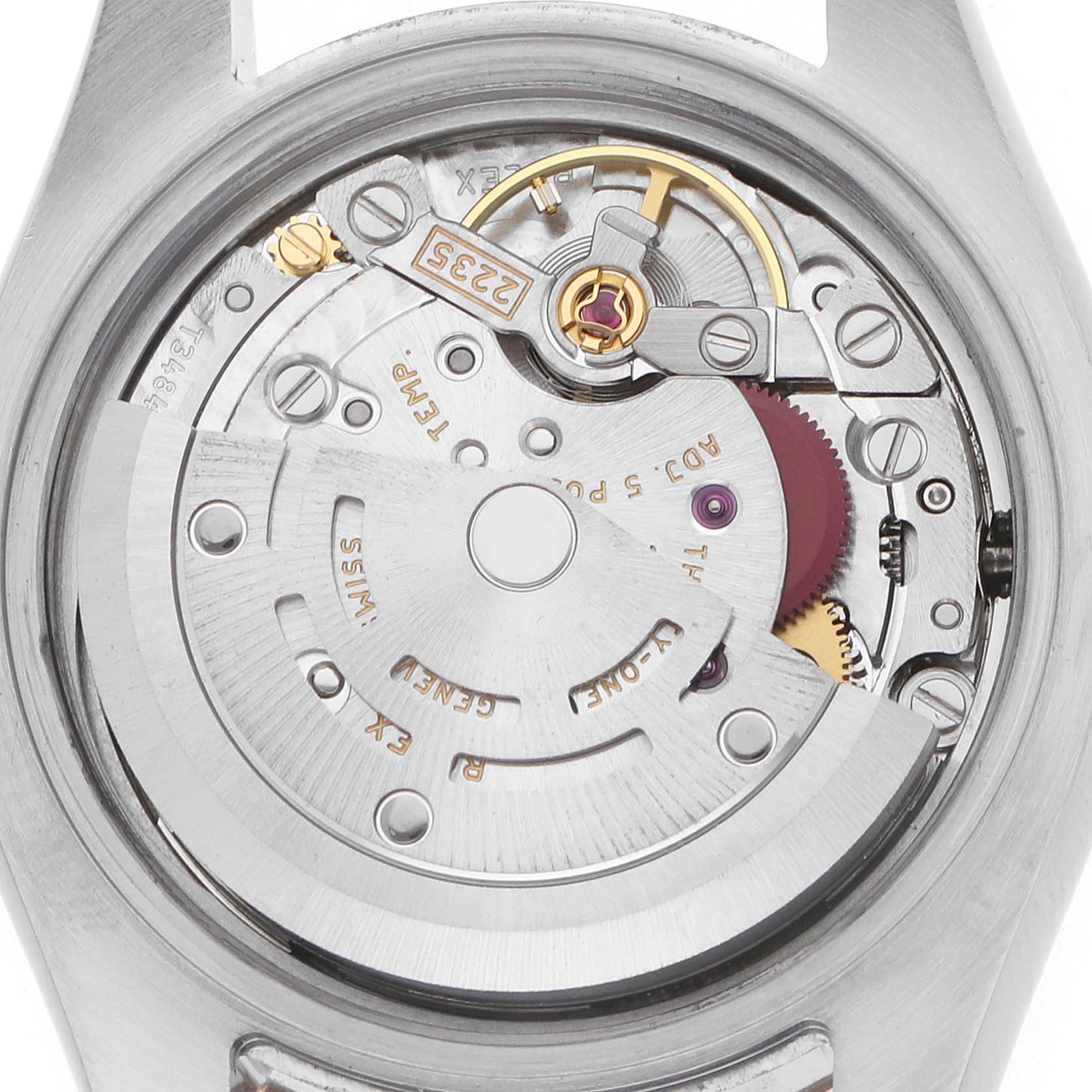 The image shows the Rolex Datejust 179171 Women's Steel and Gold (two tone) Black Dial's movement from the back, highlighting the rotor and intricate inner mechanisms.