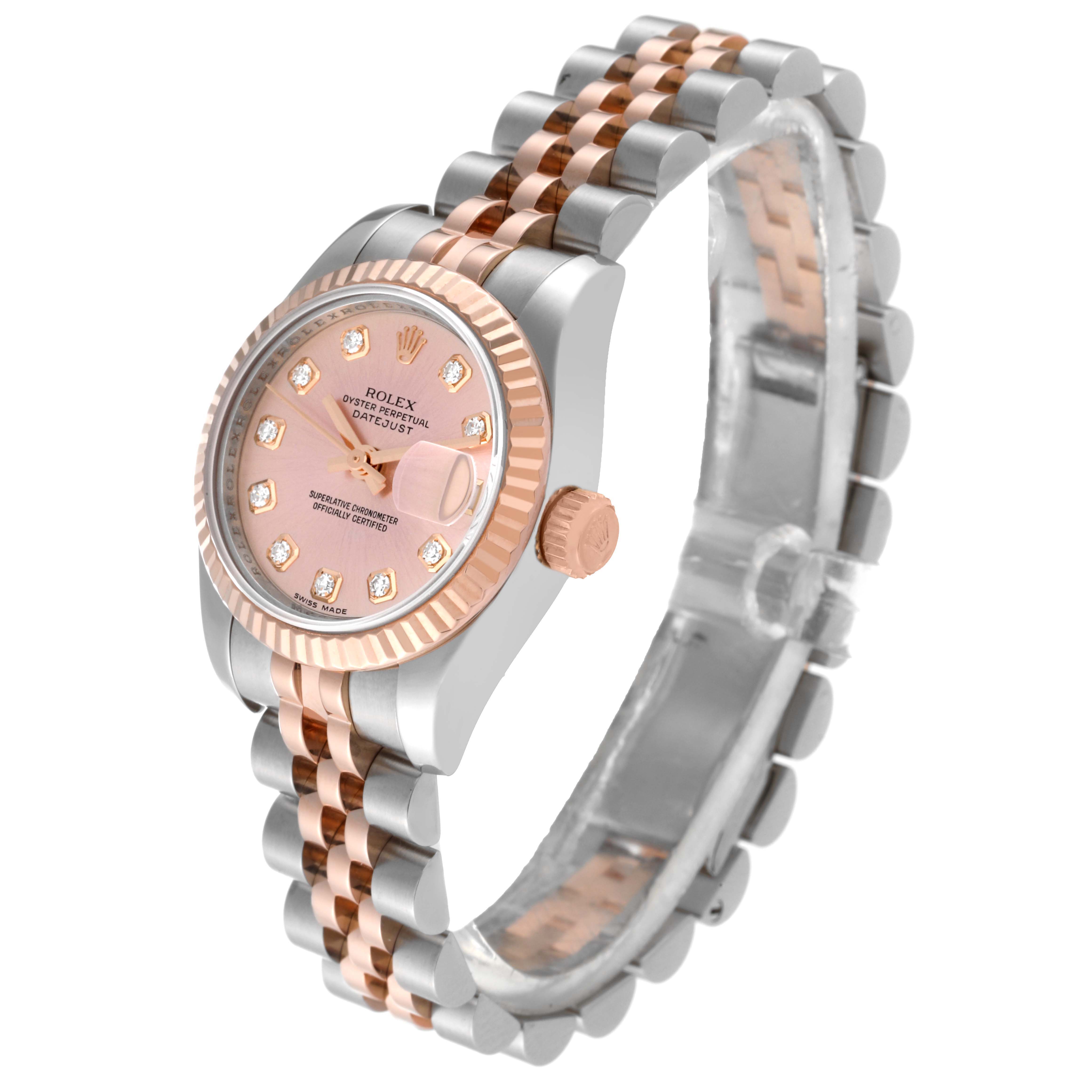 The Rolex Datejust 179171 Women's Steel and Gold (two tone) Pink Dial 179171 Women's Steel and Gold (two tone) Pink Dial watch is shown at an angle displaying the dial, bezel, crown, and two-tone bracelet.