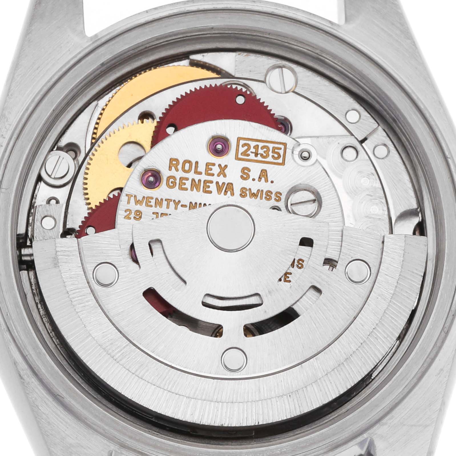 The image shows the movement of a Rolex Datejust 69174 Women's Stainless Steel Silver Dial from the back, highlighting the inner mechanics and rotor.