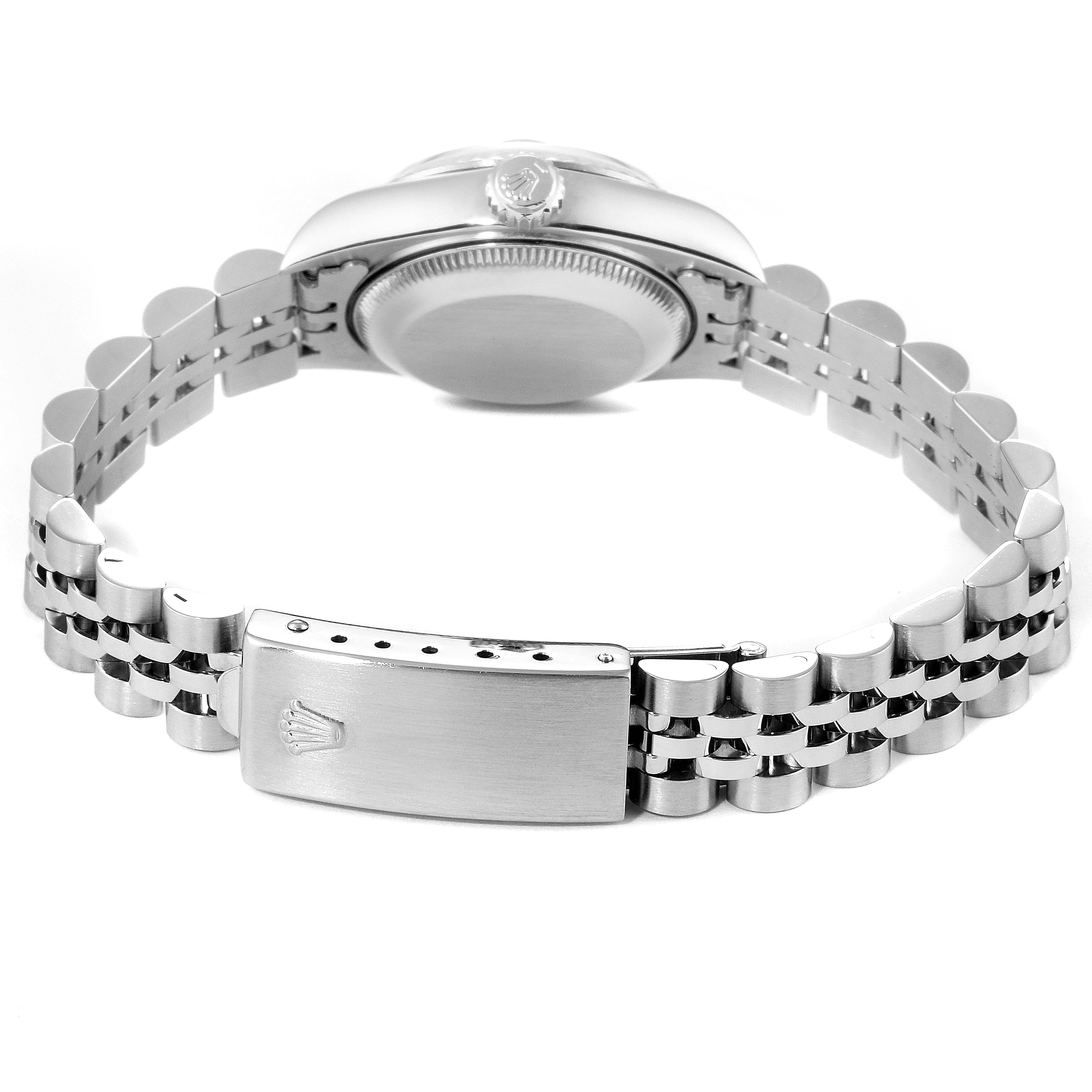 The image shows the back view of a Rolex Datejust 69174 Women's Stainless Steel Blue Dial 69174 Women's Stainless Steel Blue Dial watch, highlighting its case back, crown, and Jubilee bracelet with clasp.