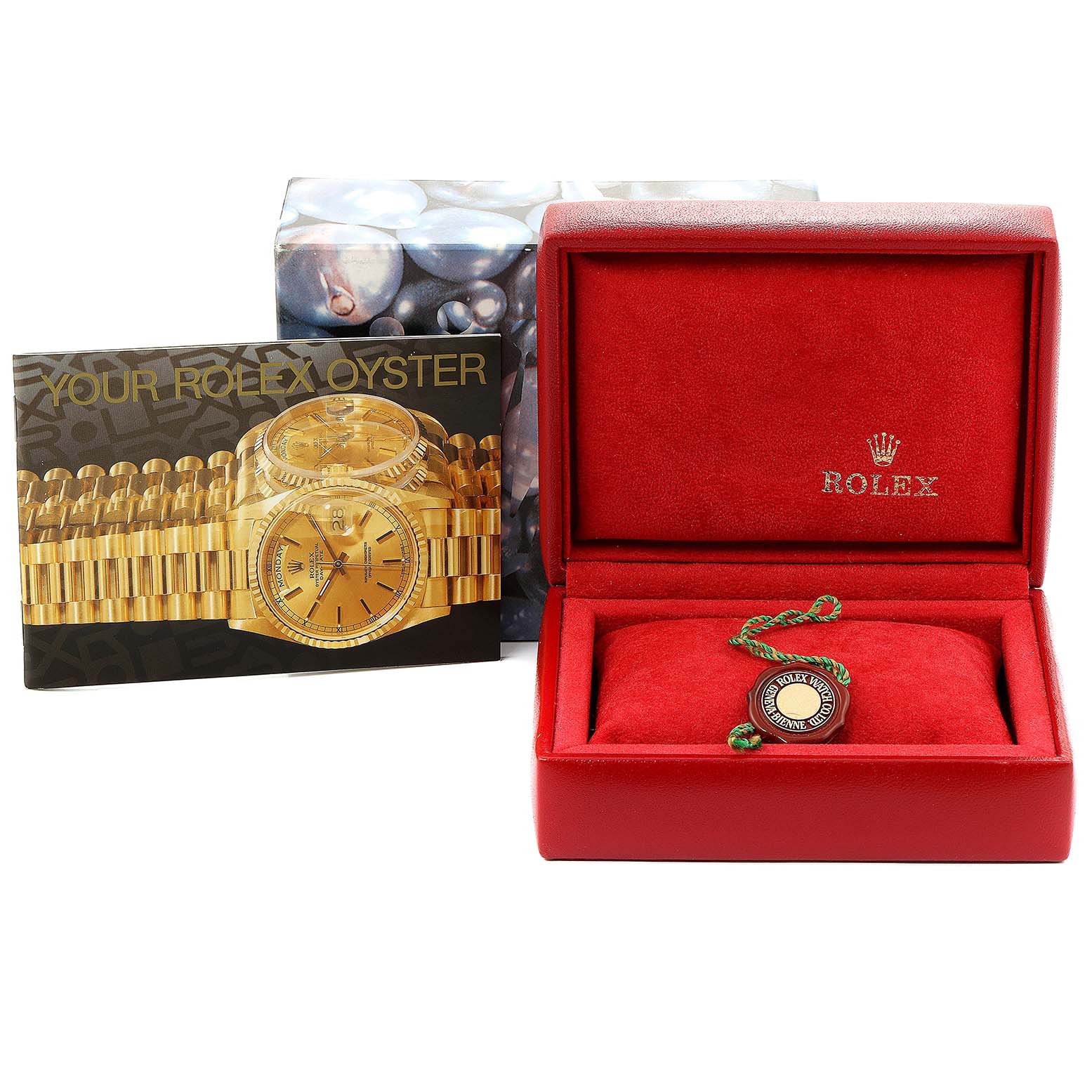 The image shows the Rolex Datejust 79174 Women's Stainless Steel Blue Dial 79174 Women's Stainless Steel Blue Dial packaging, including a red box, an attached tag, and a brochure.