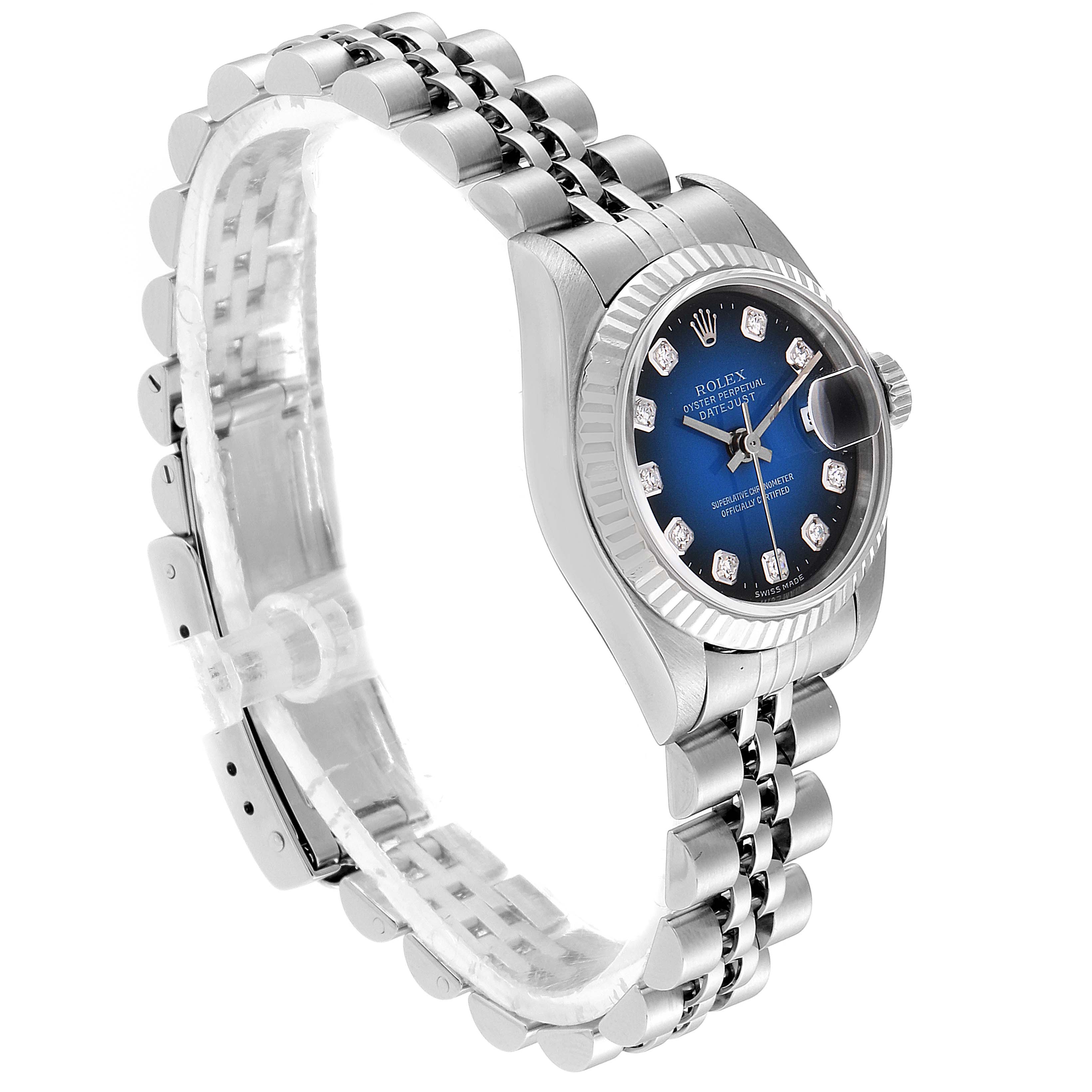 The Rolex Datejust 79174 Women's Stainless Steel Blue Dial 79174 Women's Stainless Steel Blue Dial watch is shown at an angled side view, highlighting its fluted bezel, jubilee bracelet, and blue dial with diamond markers.