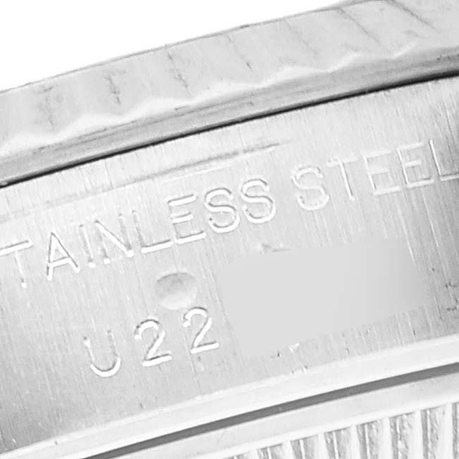 The image shows an angled close-up of the stainless steel engraving inside a Rolex Datejust 69174 Women's Stainless Steel Silver Dial 69174 Women's Stainless Steel Silver Dial watch.