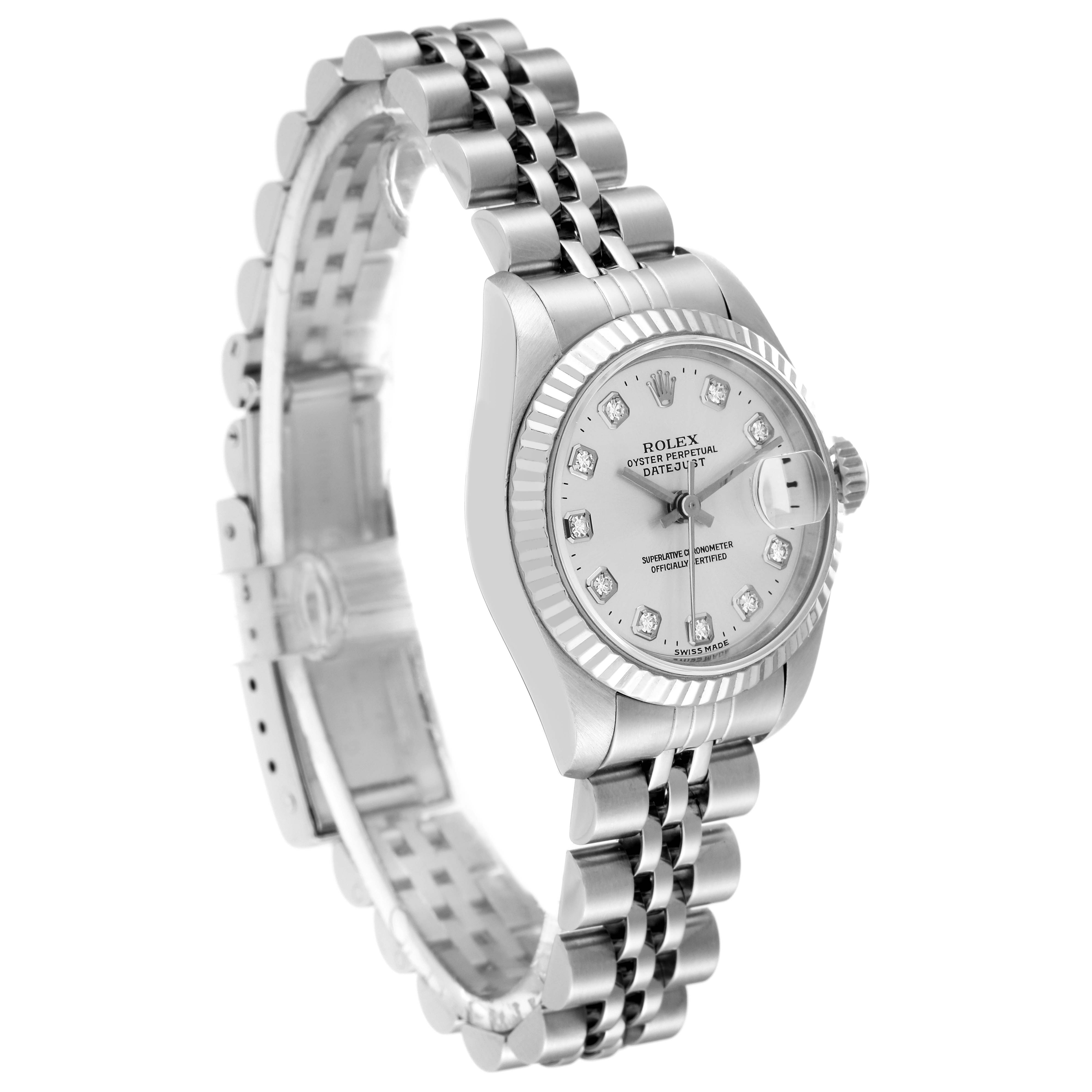 The Rolex Datejust 69174 Women's Stainless Steel Silver Dial 69174 Women's Stainless Steel Silver Dial watch is shown at an angled side view, displaying the face, dial, fluted bezel, and Jubilee bracelet.