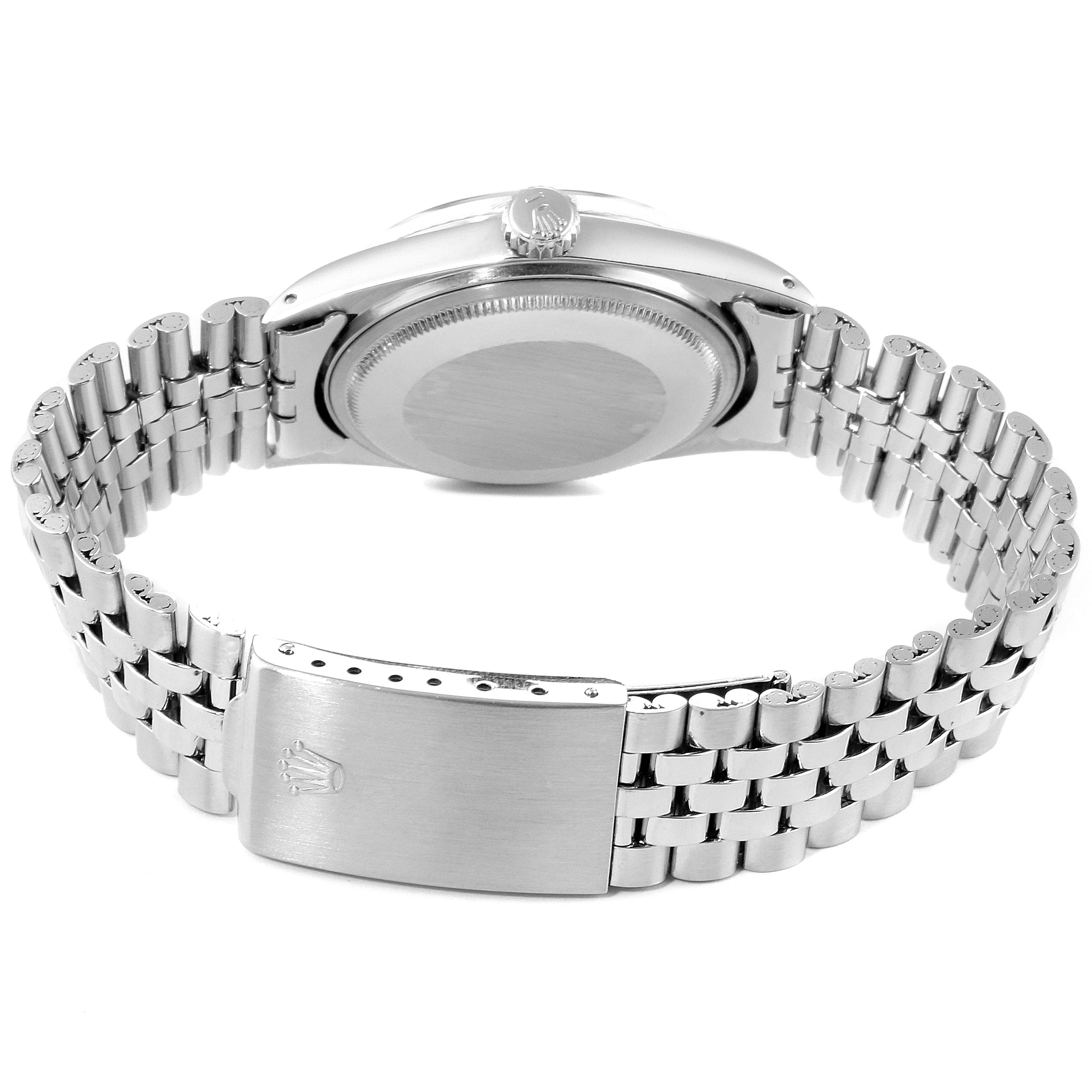 This image shows the back view of a Rolex Vintage Collection 1601 Men
s Stainless Steel Silver Dial 1601 Men
s Stainless Steel Silver Dial watch, including the case back, crown, and metal bracelet with clasp.