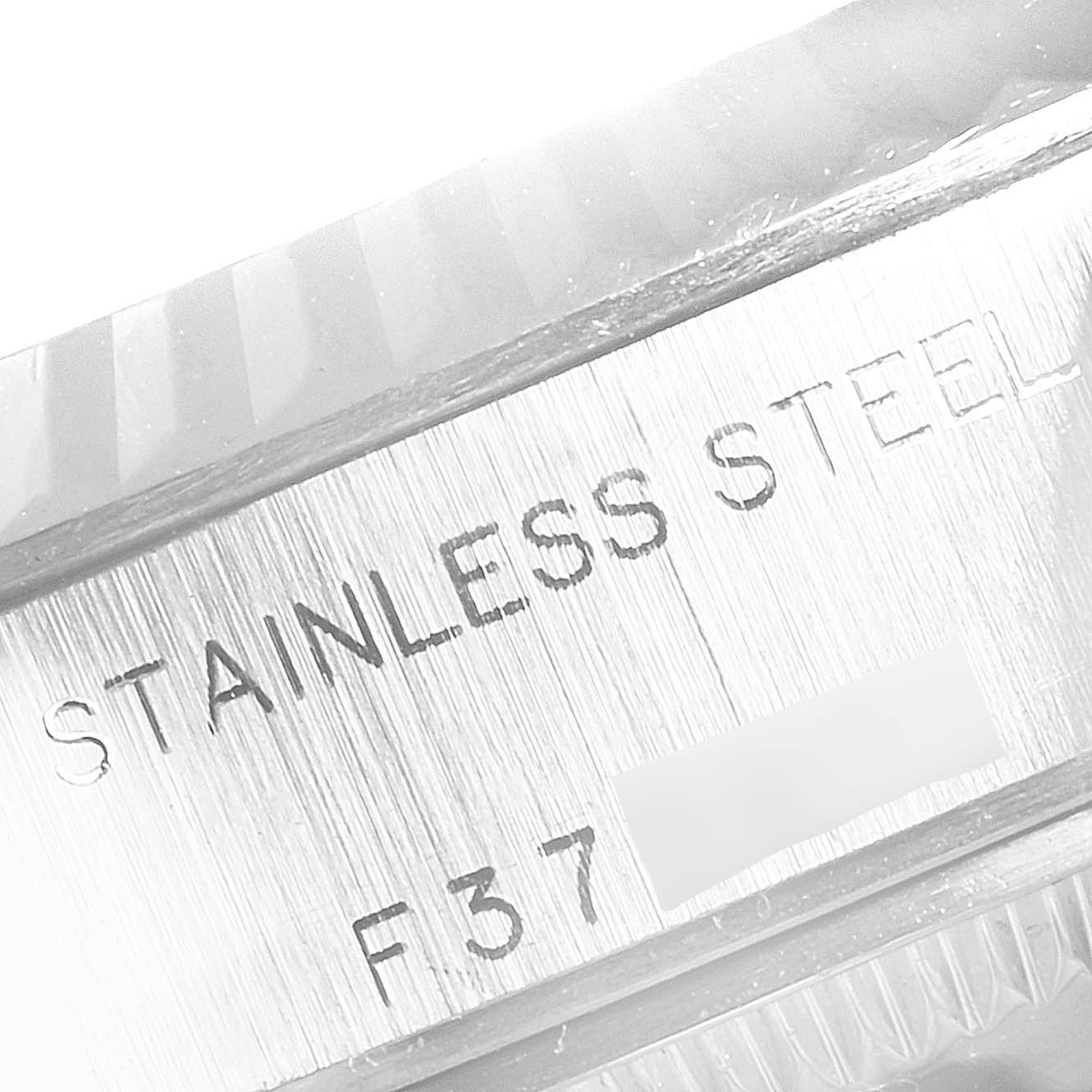 This close-up image shows the stainless steel case back of a Rolex Datejust 79174 Women's Stainless Steel Mother of Pearl Dial 79174 Women's Stainless Steel Mother of Pearl Dial watch.