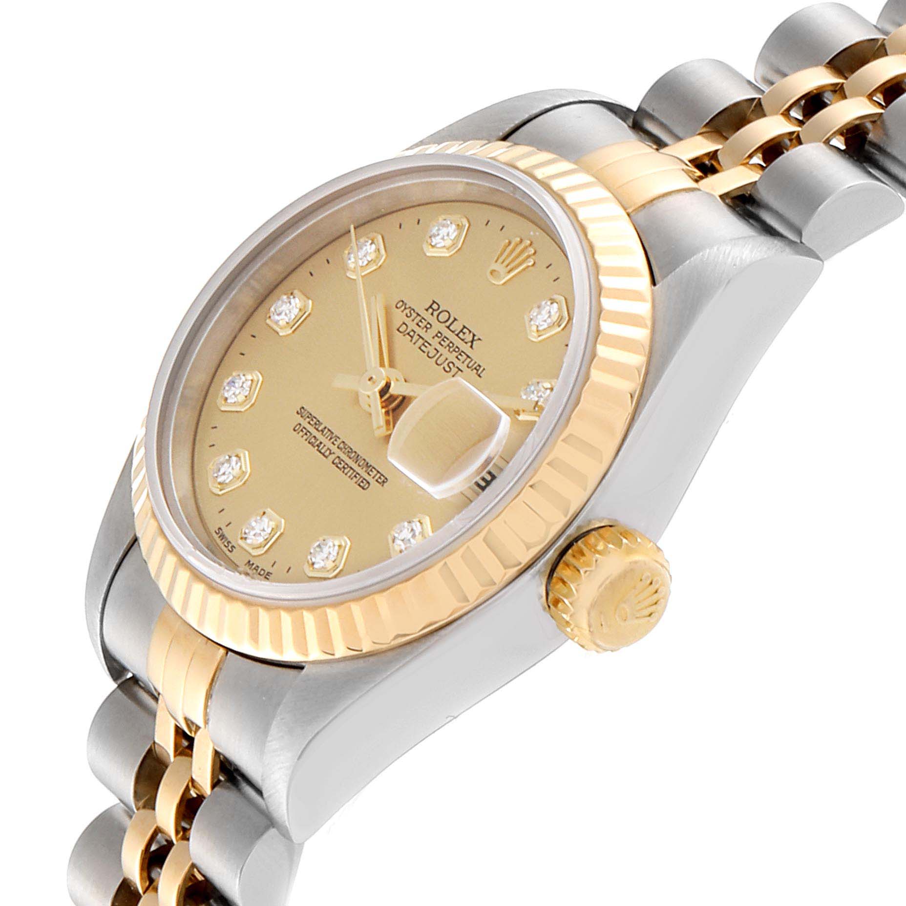 The image shows a side angle of the Rolex Datejust 69173 Women
s Steel and Gold (two tone) Champagne Dial 69173 Women
s Steel and Gold (two tone) Champagne Dial watch, highlighting the crown, dial, and part of the bracelet.