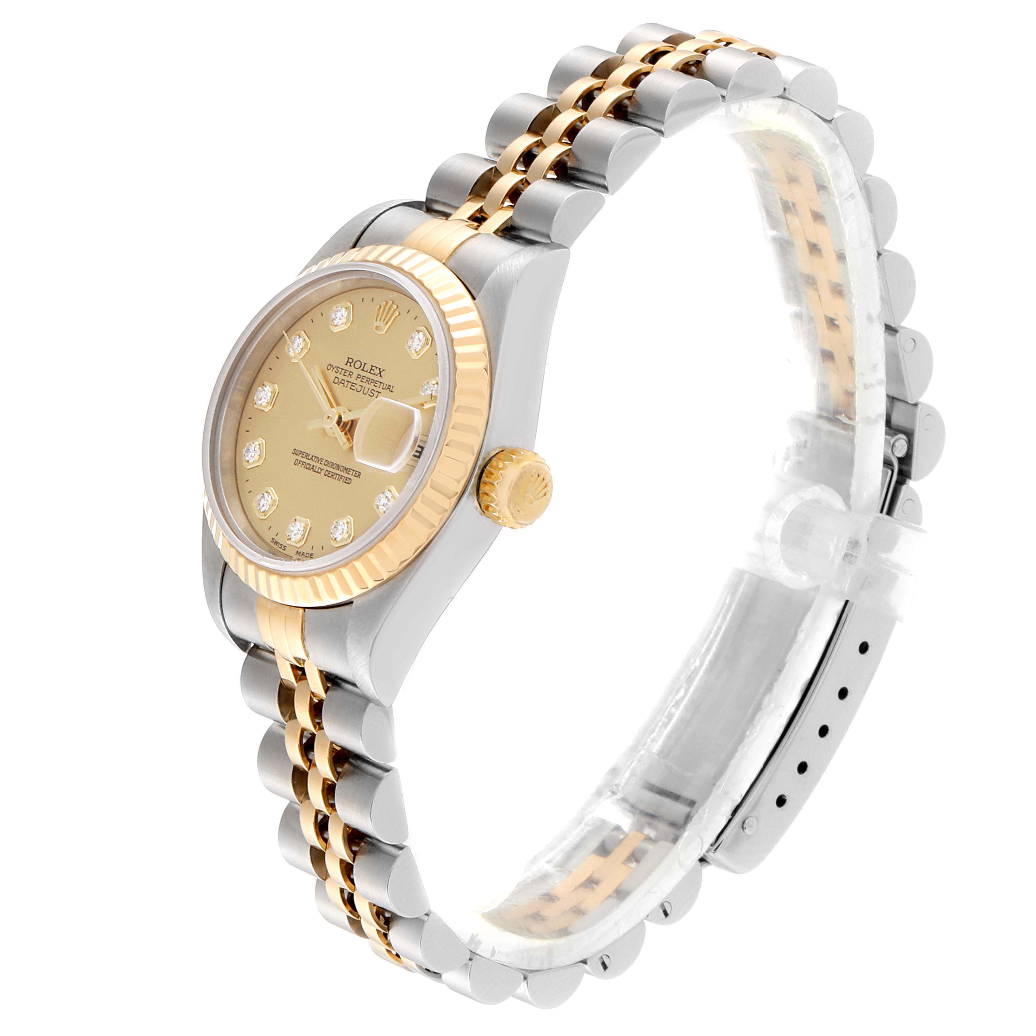 This image shows a Rolex Datejust 69173 Women
s Steel and Gold (two tone) Champagne Dial 69173 Women
s Steel and Gold (two tone) Champagne Dial watch at a side angle, highlighting the gold and silver two-tone bracelet and bezel.