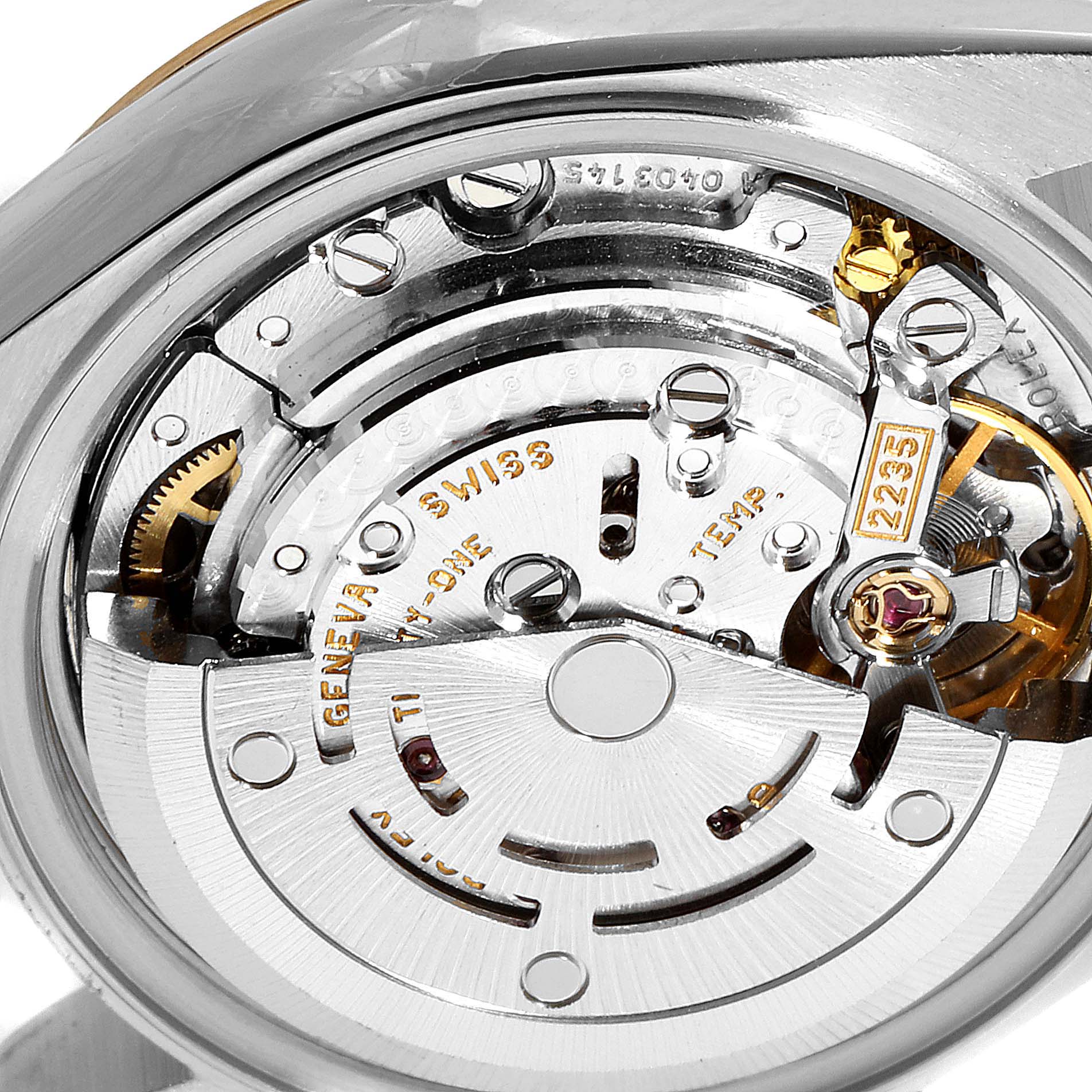 This image shows the intricate internal mechanism of a Rolex Datejust 69173 Women
s Steel and Gold (two tone) Champagne Dial 69173 Women
s Steel and Gold (two tone) Champagne Dial watch from a close-up, top-down angle.