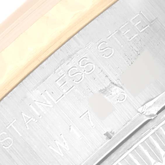 Close-up angle of the case back showing "STAINLESS STEEL" on a Rolex Datejust 69173 Women's Steel and Gold (two tone) Champagne Dial 69173 Women's Steel and Gold (two tone) Champagne Dial watch.