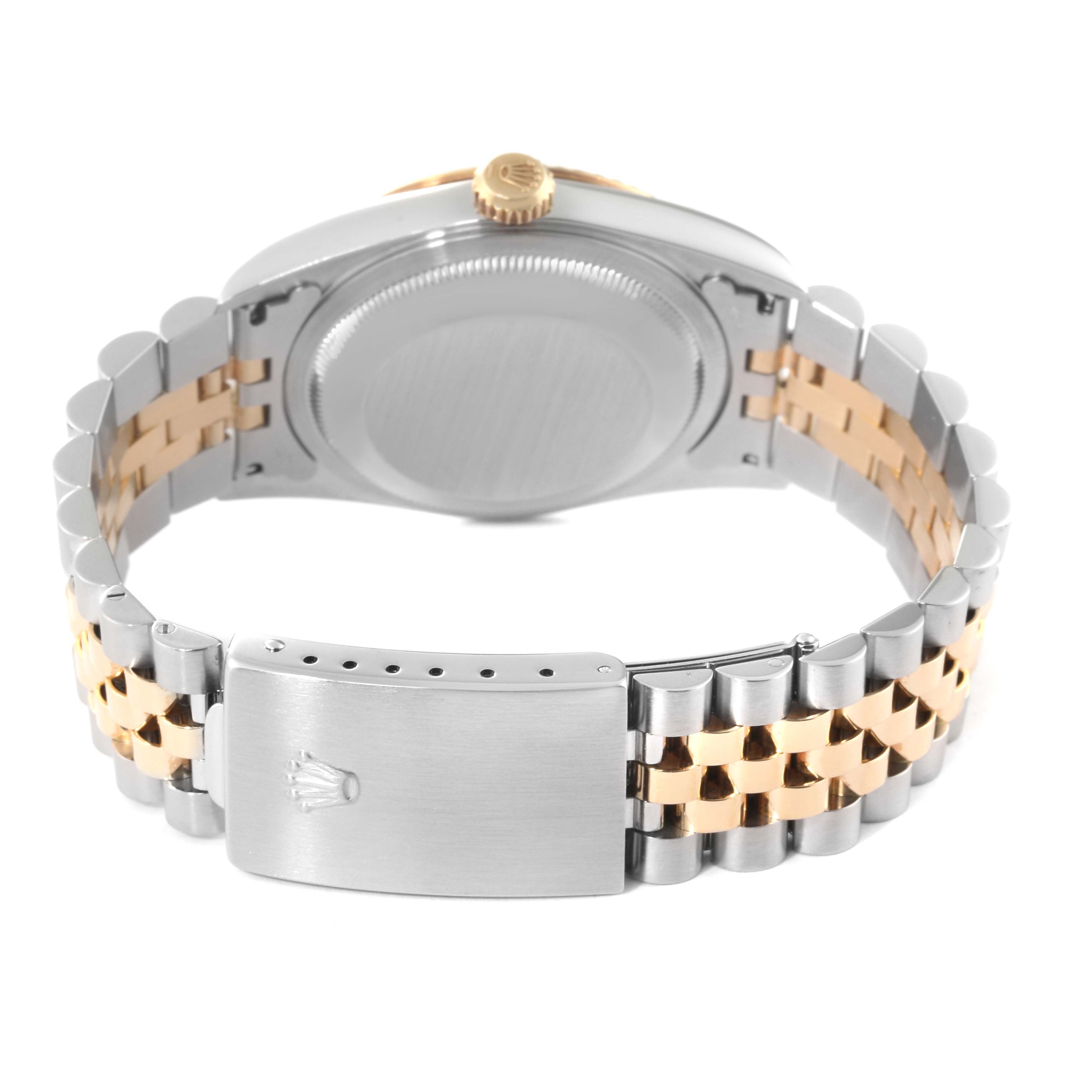 This image shows the back view of a Rolex Datejust 16233 Men
s Steel and Gold (two tone) Champagne Dial 16233 Men
s Steel and Gold (two tone) Champagne Dial watch, highlighting the case, crown, and the two-tone metal bracelet with a clasp.