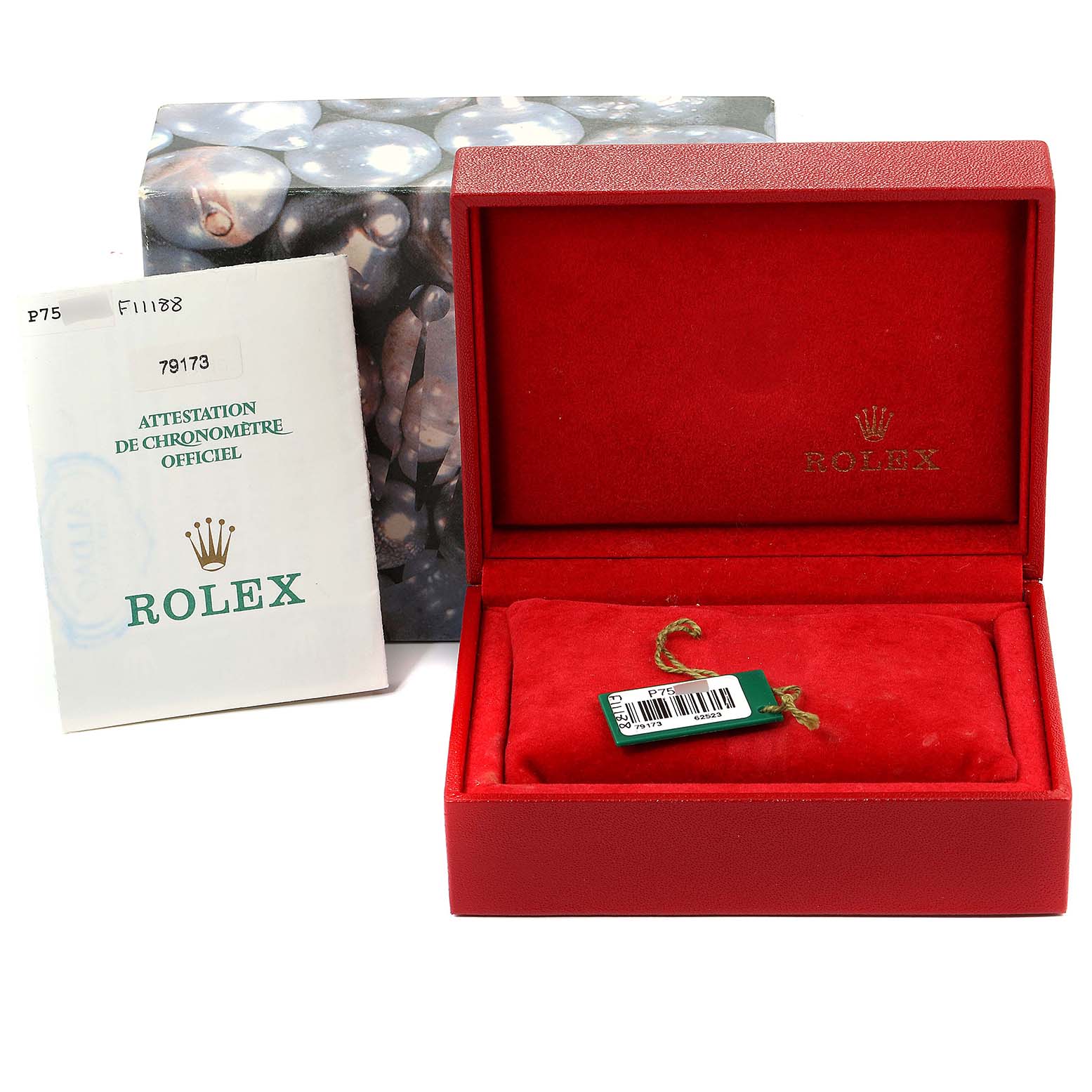 The image shows a Rolex Datejust 79173 Women
s Steel and Gold (two tone) White Dial 79173 Women
s Steel and Gold (two tone) White Dial packaging including the official chronometer certification, box, and cushion with tag.