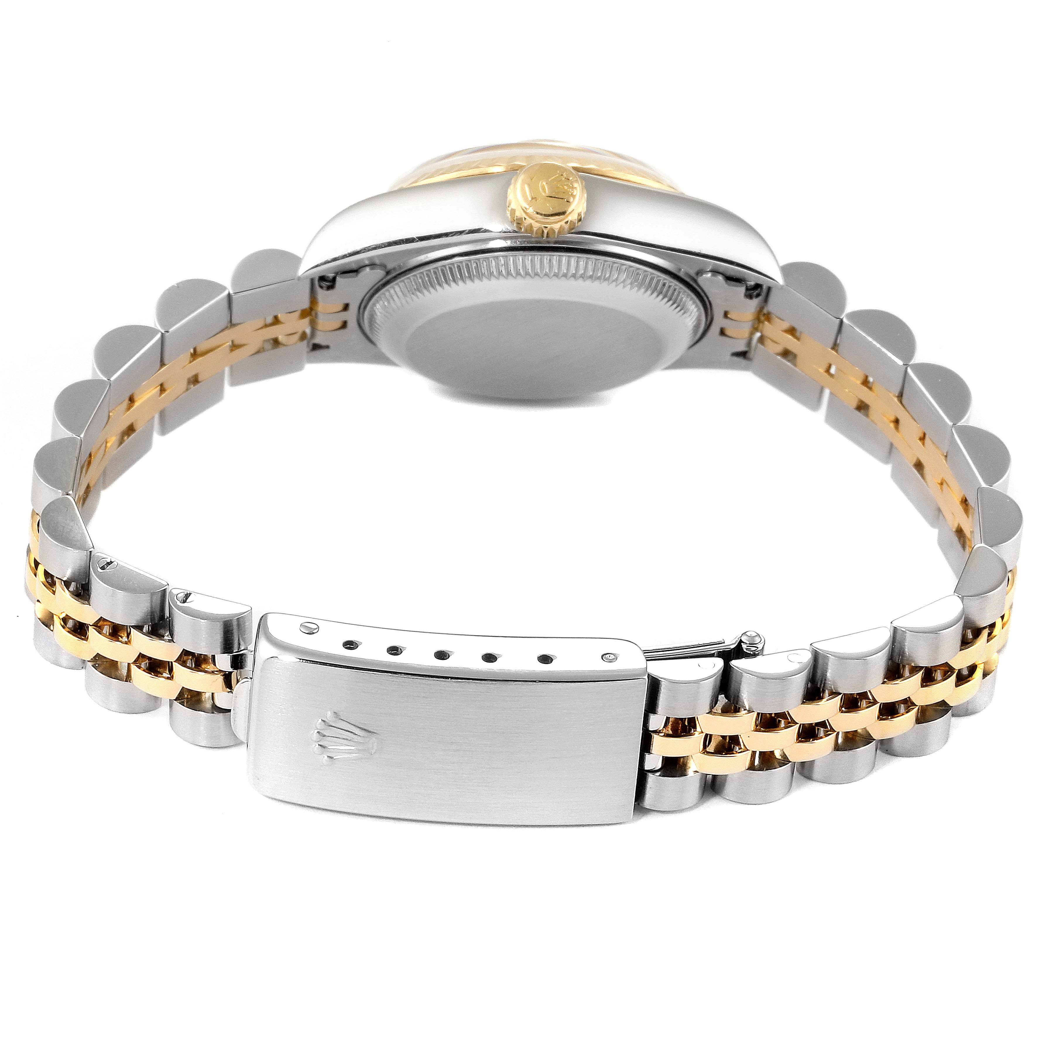 The image shows the back of the Rolex Datejust 79173 Women
s Steel and Gold (two tone) Champagne Dial 79173 Women
s Steel and Gold (two tone) Champagne Dial watch, focusing on the clasp, bracelet, and case back.