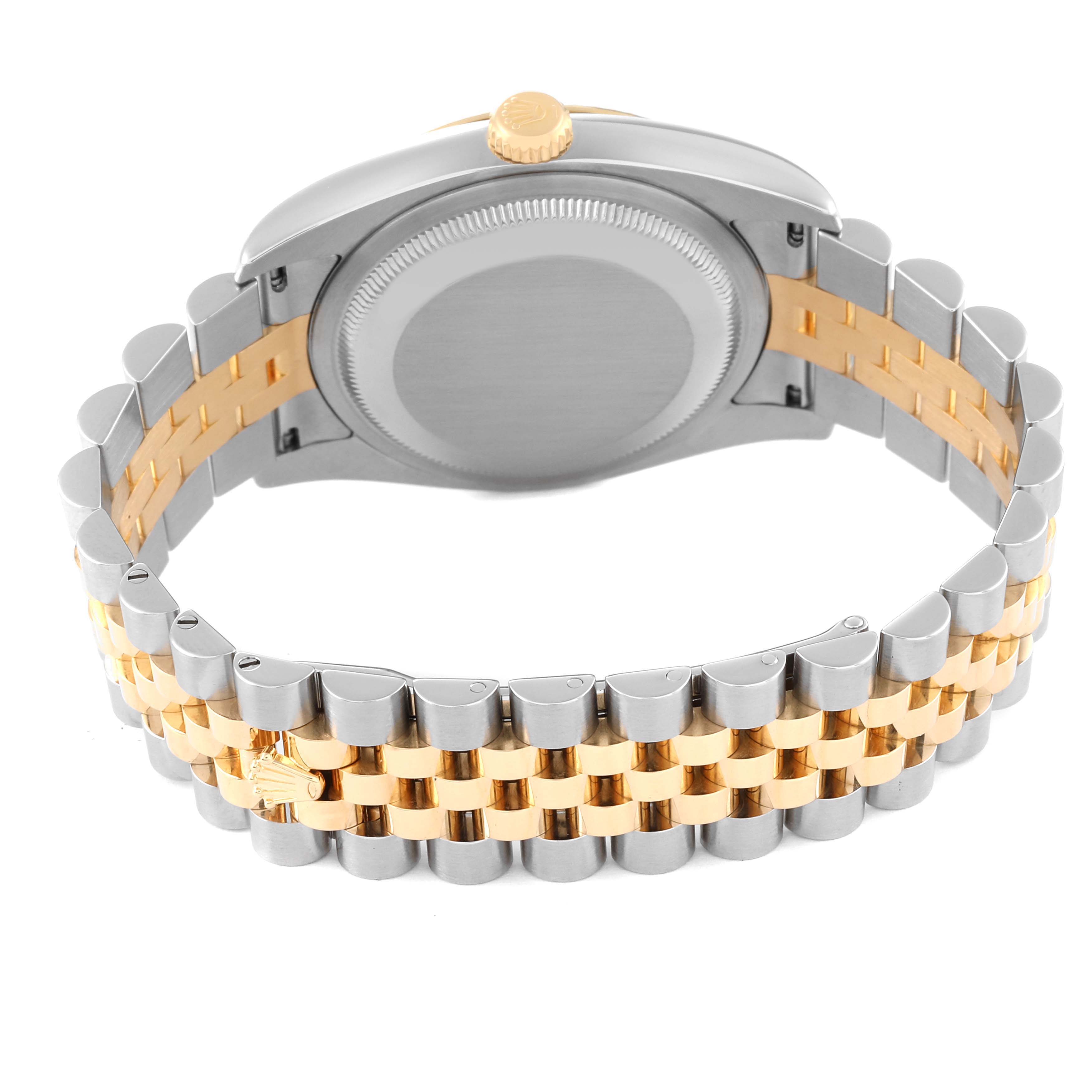 The image shows the back and bracelet of a Rolex Datejust 116233 Men's Steel and Gold (two tone) Beige Dial 116233 Men's Steel and Gold (two tone) Beige Dial watch in a combination of gold and silver.