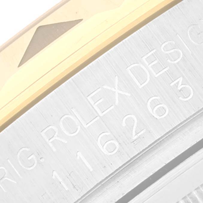 This image shows a close-up of the bezel and side case engraving of a Rolex Turn-o-Graph 116263 Men's Steel and Gold (two tone) Grey Dial 116263 Men's Steel and Gold (two tone) Grey Dial watch.