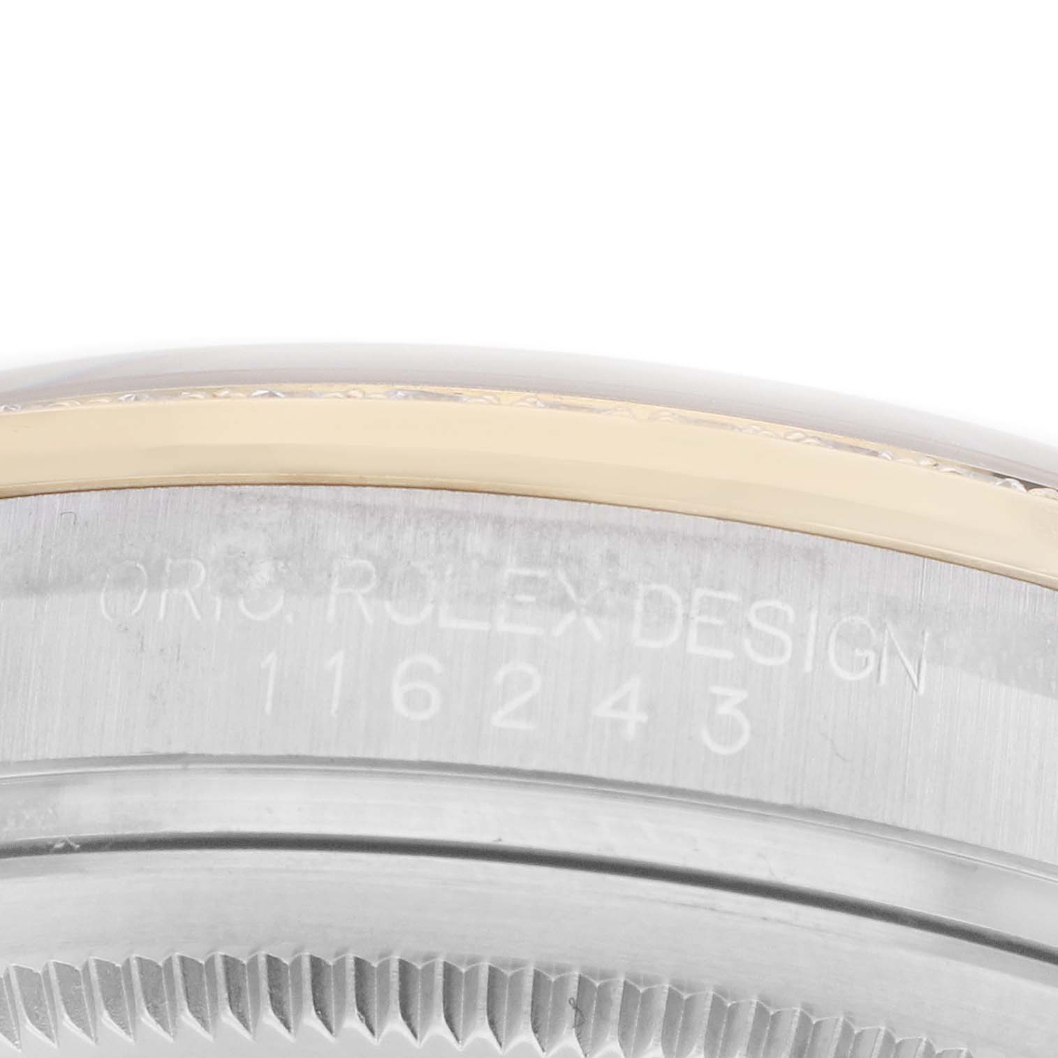 The image shows a close-up of the case edge and part of the bezel of a Rolex Datejust 116243 Men's Steel and Gold (two tone) Champagne Dial watch.