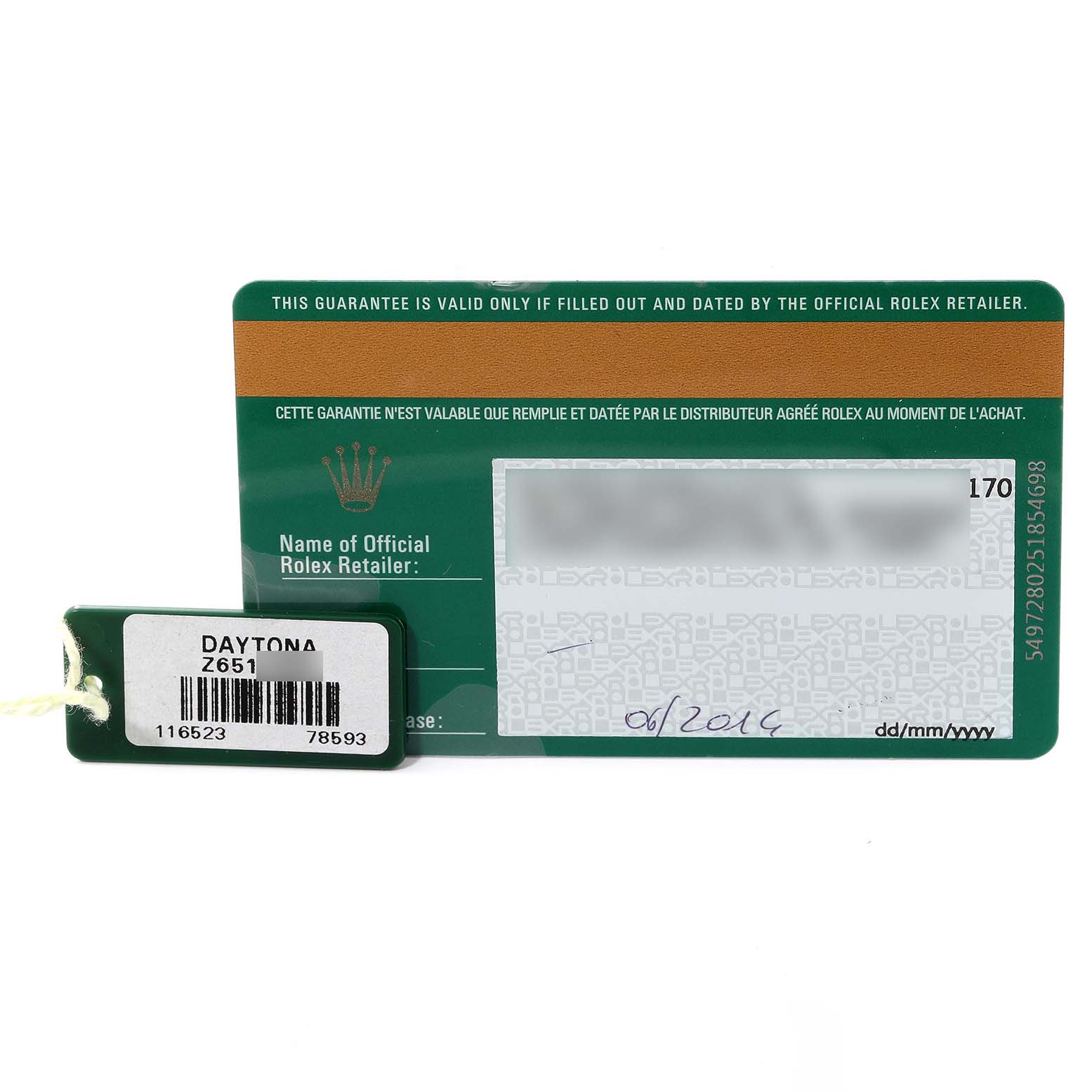 This image shows the warranty card and tag for the Rolex Daytona 116523 Men's Steel and Gold (two tone) Black Dial 116523 Men's Steel and Gold (two tone) Black Dial model.