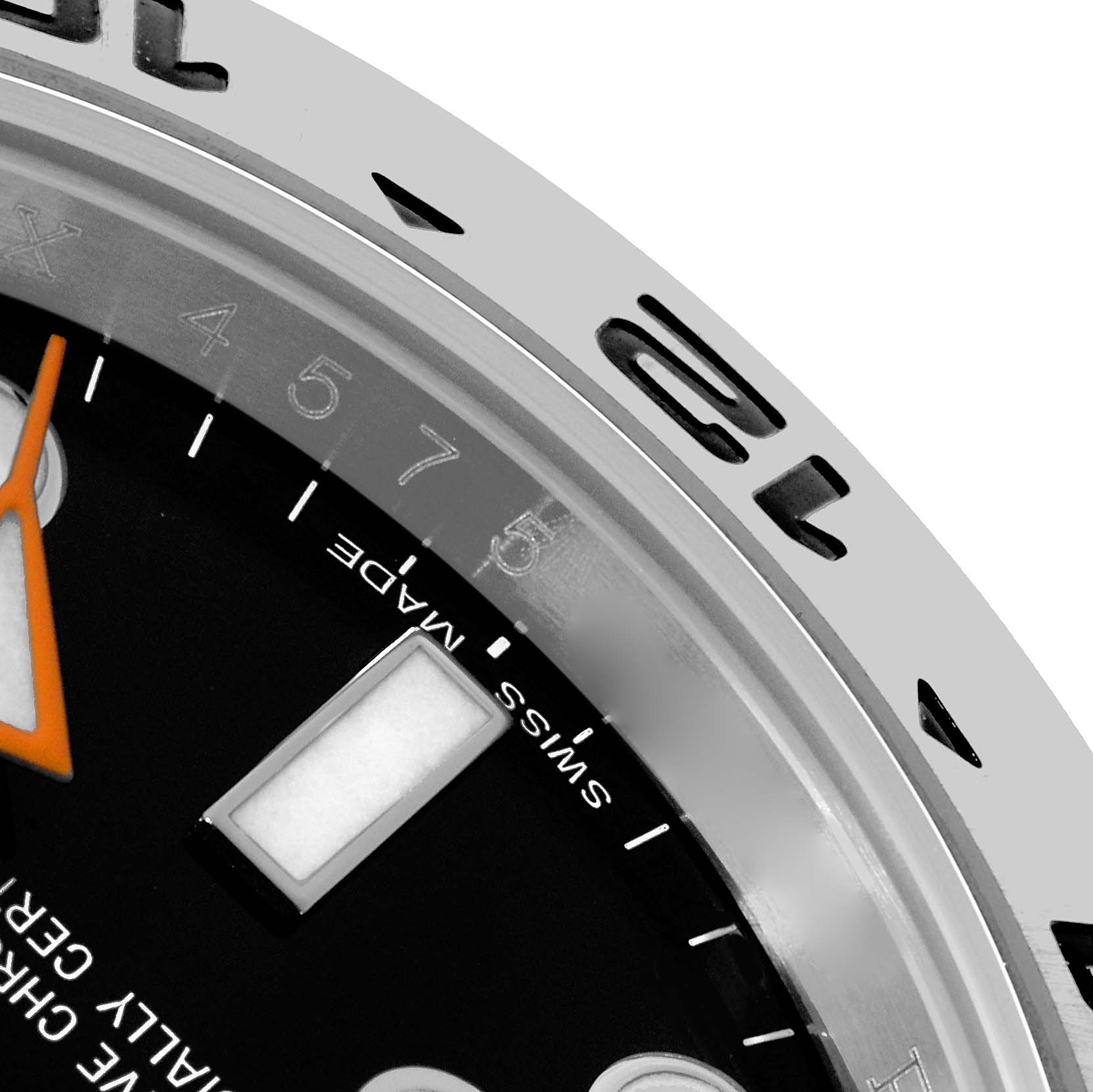 The image shows a close-up of the dial, bezel, and hour markers of a Rolex Explorer 216570 Men
s Stainless Steel Black Dial watch.