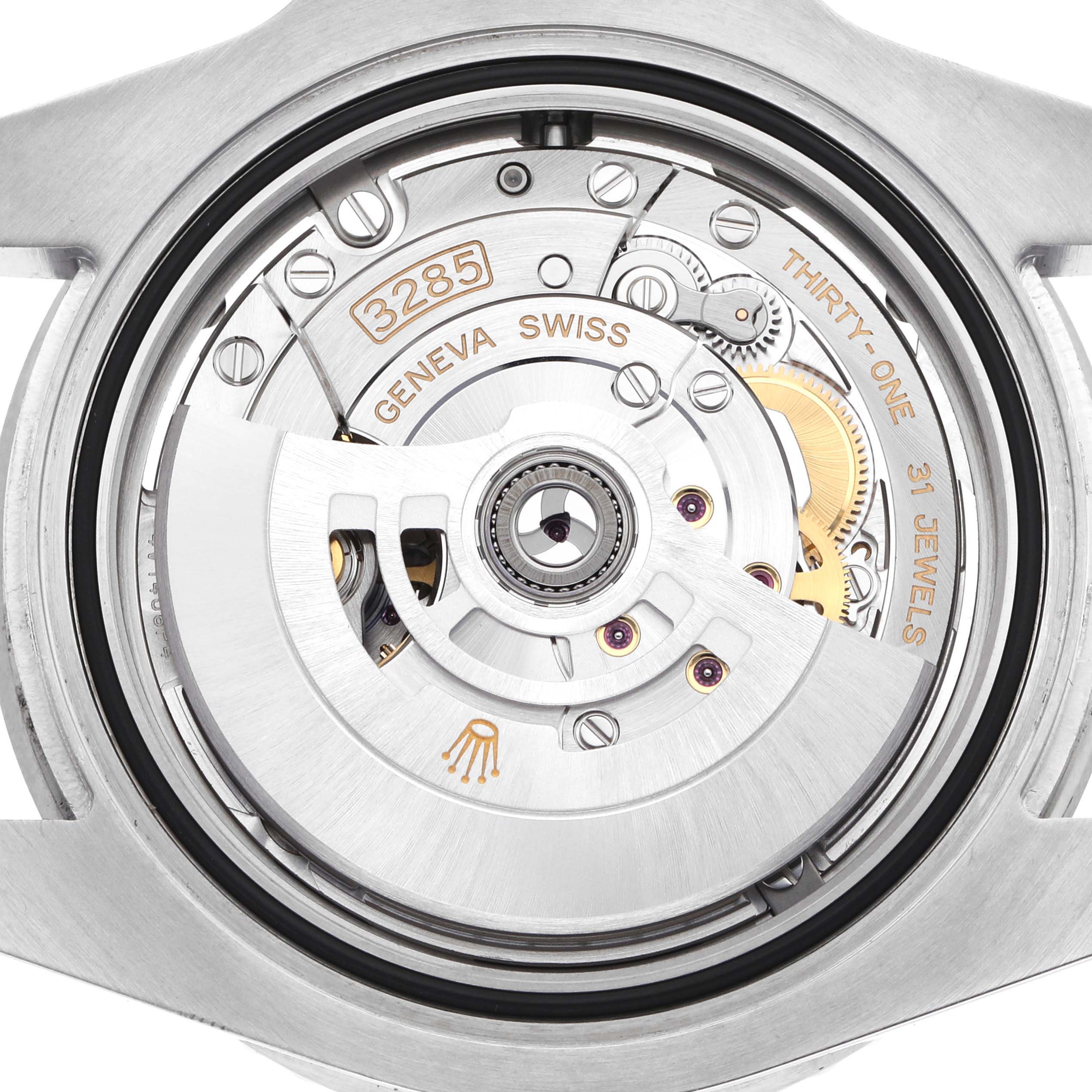 The image shows the movement of a Rolex GMT-Master 126710 Men
s Stainless Steel Black Dial, focusing on the rotor and inner mechanisms from the back.