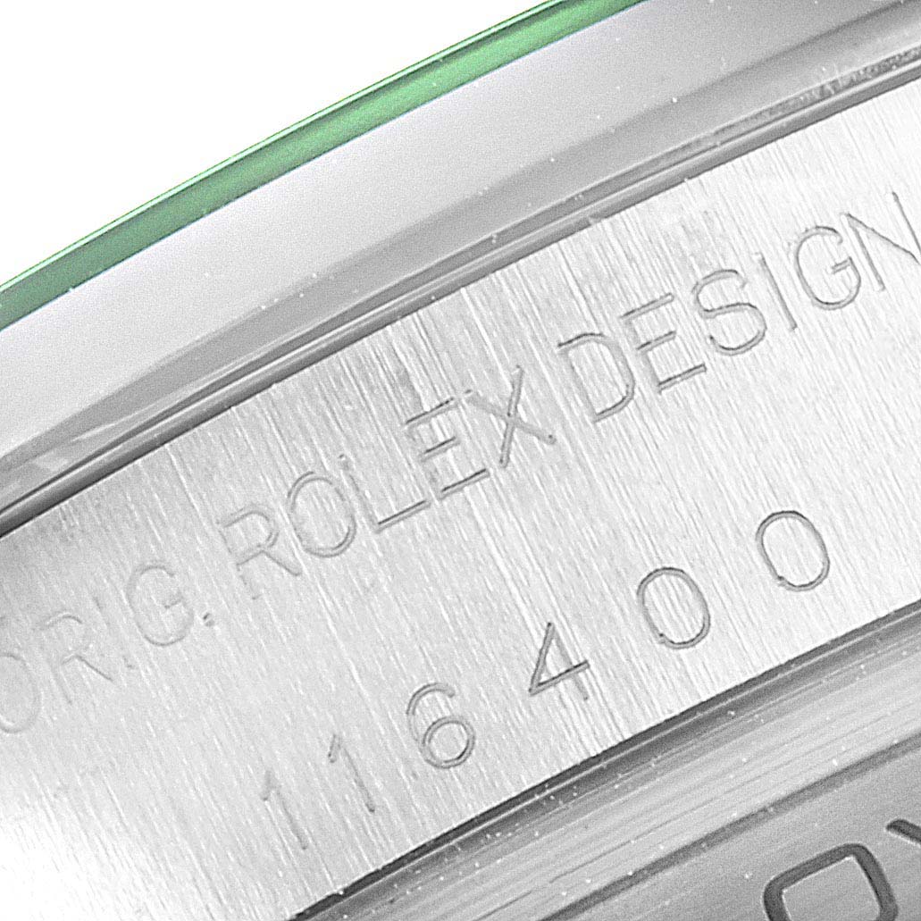 The image shows a close-up of the serial number engraving on the side bezel of a Rolex Milgauss 116400GV Men's Stainless Steel Black Dial 116400GV Men's Stainless Steel Black Dial watch.