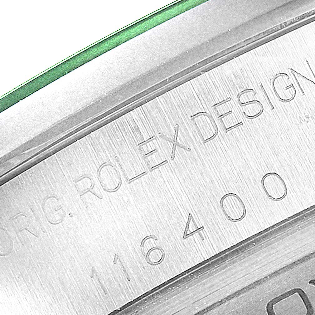 This close-up shows the engraved model number and brand markings on the side of the Rolex Milgauss 116400GV Men's Stainless Steel Black Dial 116400GV Men's Stainless Steel Black Dial watch case.