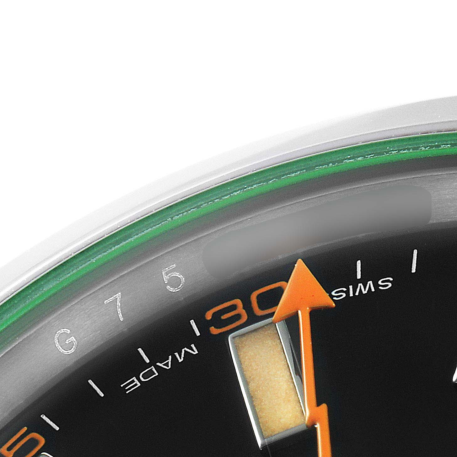 This is a close-up of the Rolex Milgauss 116400GV Men's Stainless Steel Black Dial 116400GV Men's Stainless Steel Black Dial watch showing the top portion of the dial, including the “7-5” mark and the orange lightning bolt seconds hand.