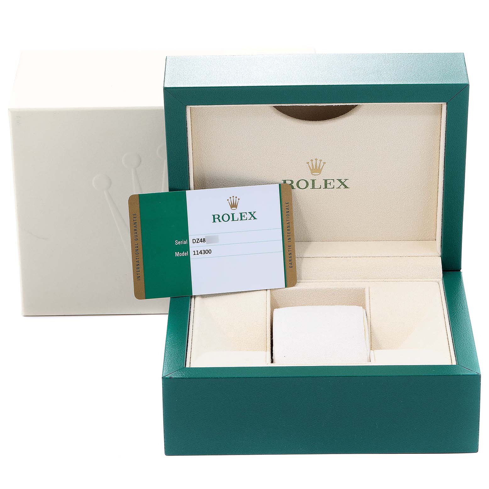 The image shows an empty green Rolex Oyster Perpetual 114300 Men's Stainless Steel Blue Dial 114300 Men's Stainless Steel Blue Dial watch box and warranty card from a front angle.