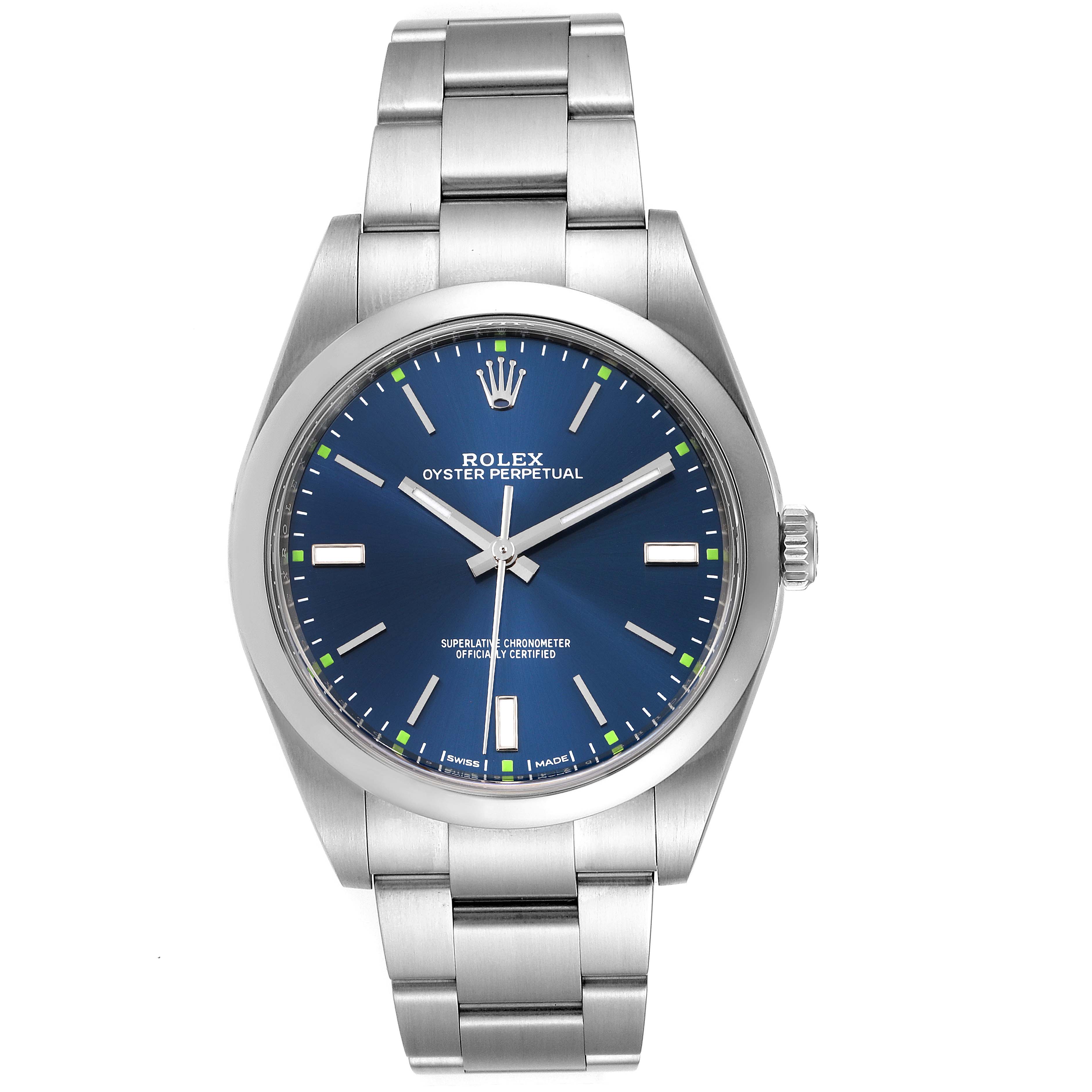 The image shows a Rolex Oyster Perpetual 114300 Men's Stainless Steel Blue Dial 114300 Men's Stainless Steel Blue Dial watch with a blue dial, silver indices, and a stainless steel bracelet, viewed from the front.