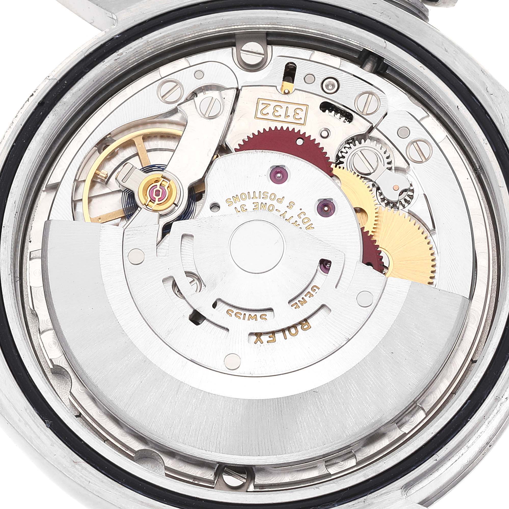 This image shows a close-up view of the inner movement mechanism of a Rolex Oyster Perpetual 114300 Men's Stainless Steel Blue Dial 114300 Men's Stainless Steel Blue Dial watch.