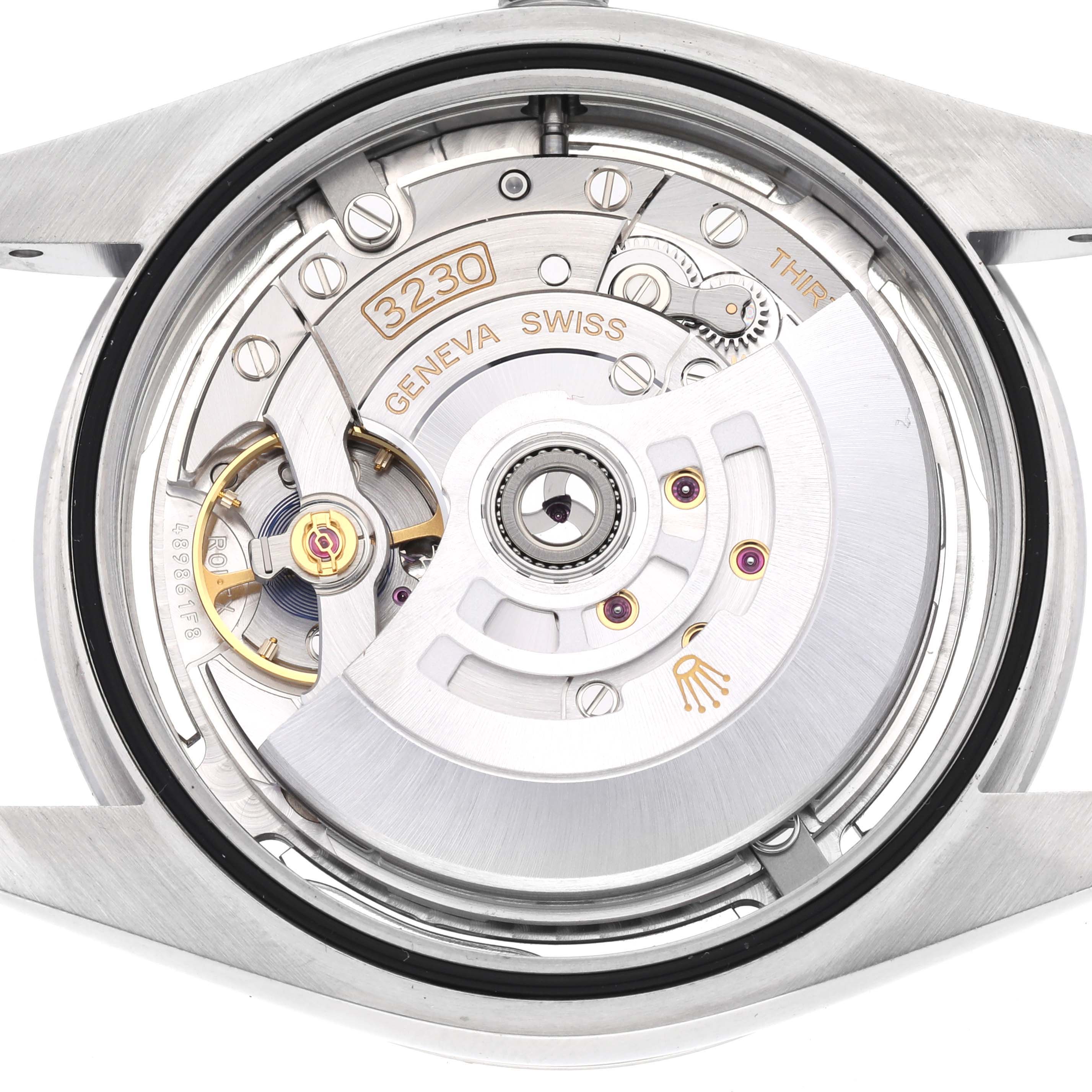 The image shows the internal mechanism of the Rolex Oyster Perpetual 124300 Men's Stainless Steel Silver Dial 124300 Men's Stainless Steel Silver Dial model, highlighting its movement and intricate parts.