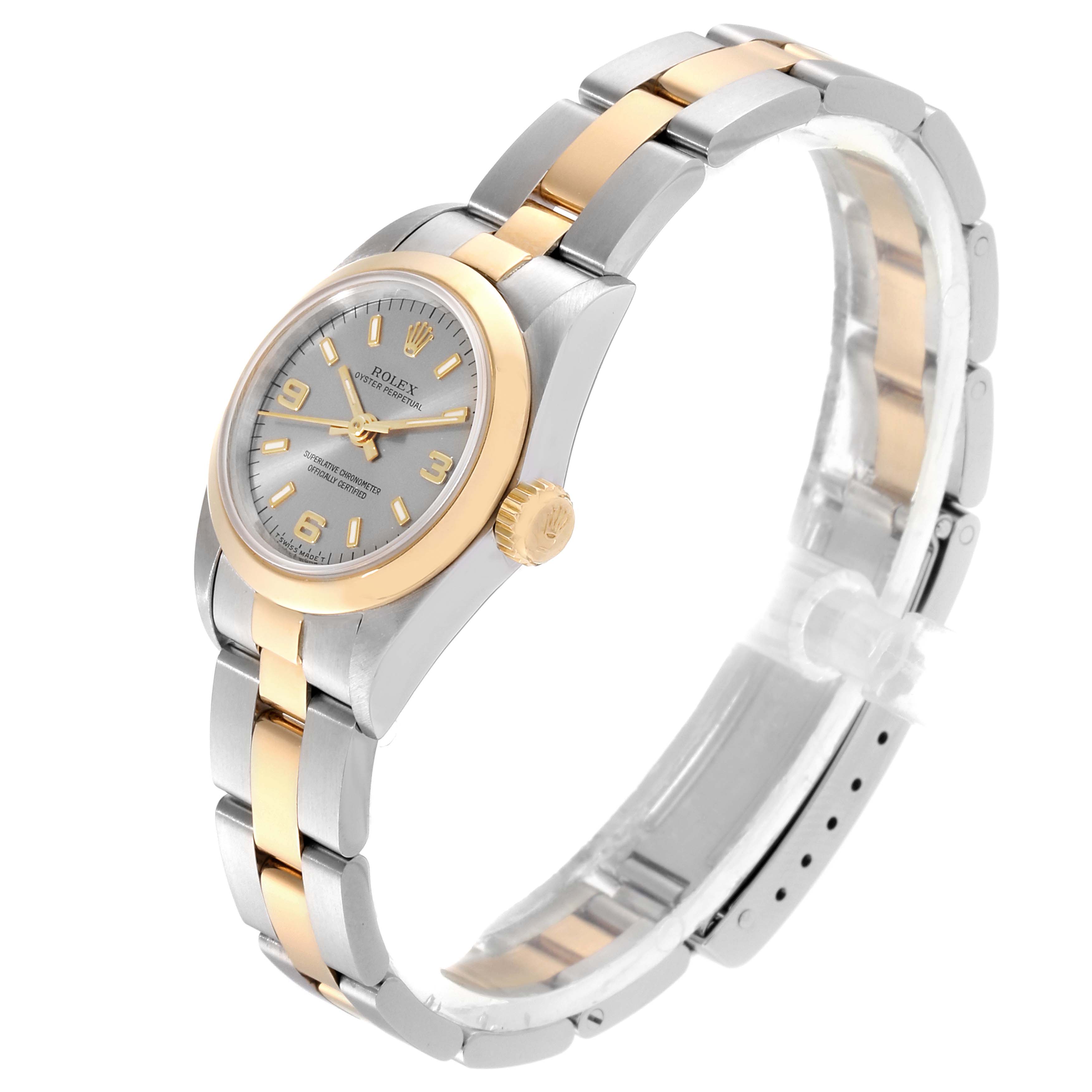 The image shows a side angle of a Rolex Datejust 67183 Women
s Steel and Gold (two tone) Grey Dial 67183 Women
s Steel and Gold (two tone) Grey Dial watch, highlighting its two-tone bracelet, case, bezel, and dial.