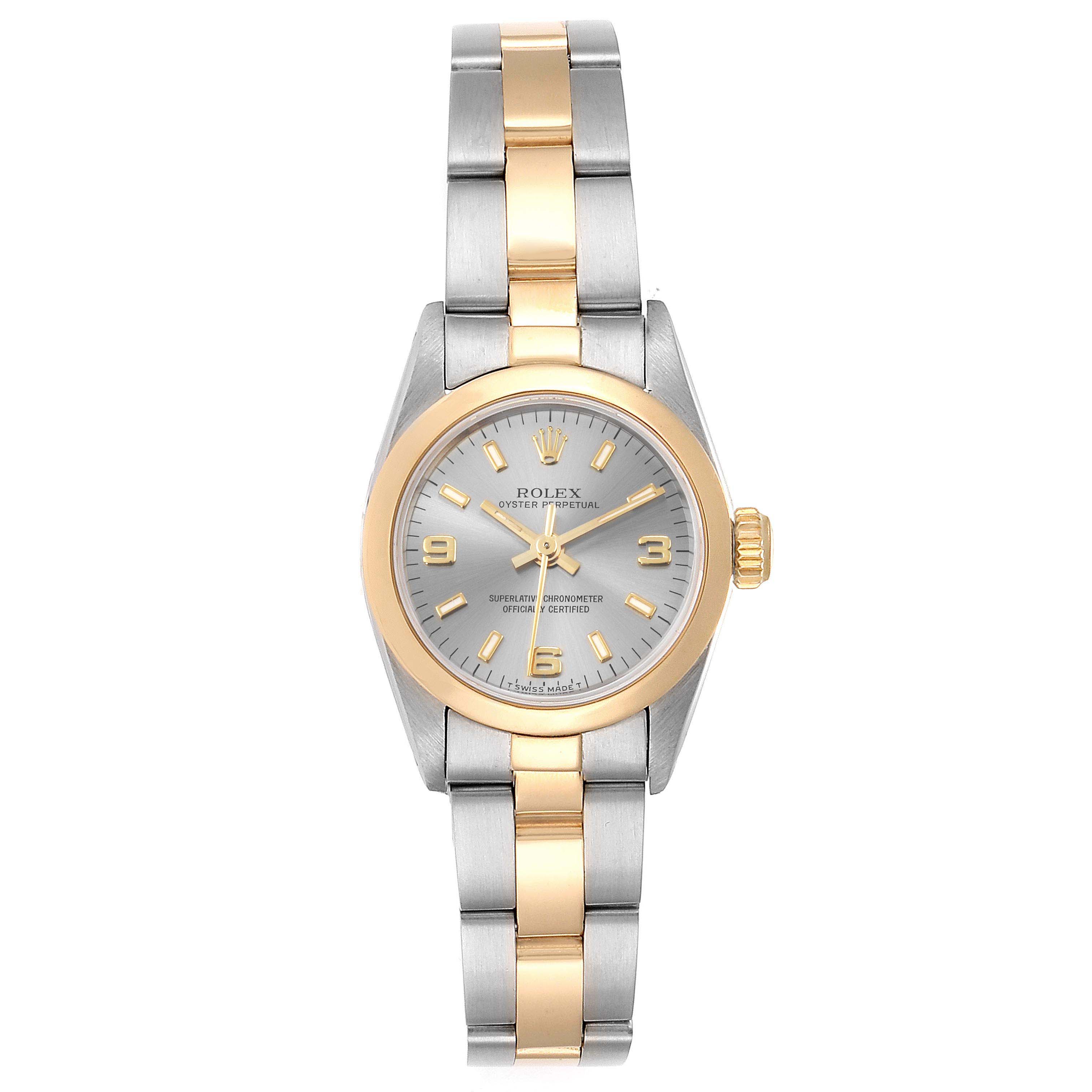 The image shows a front view of a Rolex Datejust 67183 Women
s Steel and Gold (two tone) Grey Dial 67183 Women
s Steel and Gold (two tone) Grey Dial watch with a two-tone bracelet and gold bezel.