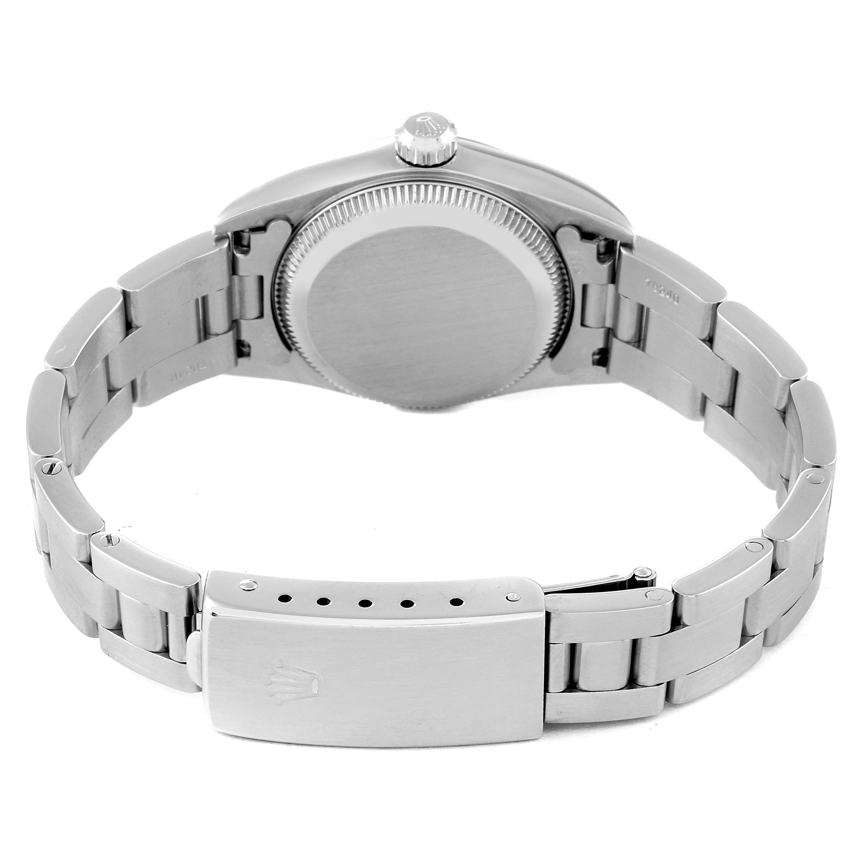 This image shows the back of the Rolex Oyster Perpetual 76030 Women's Stainless Steel Pink Dial 76030 Women's Stainless Steel Pink Dial watch, including the case back and part of the bracelet with the clasp open.