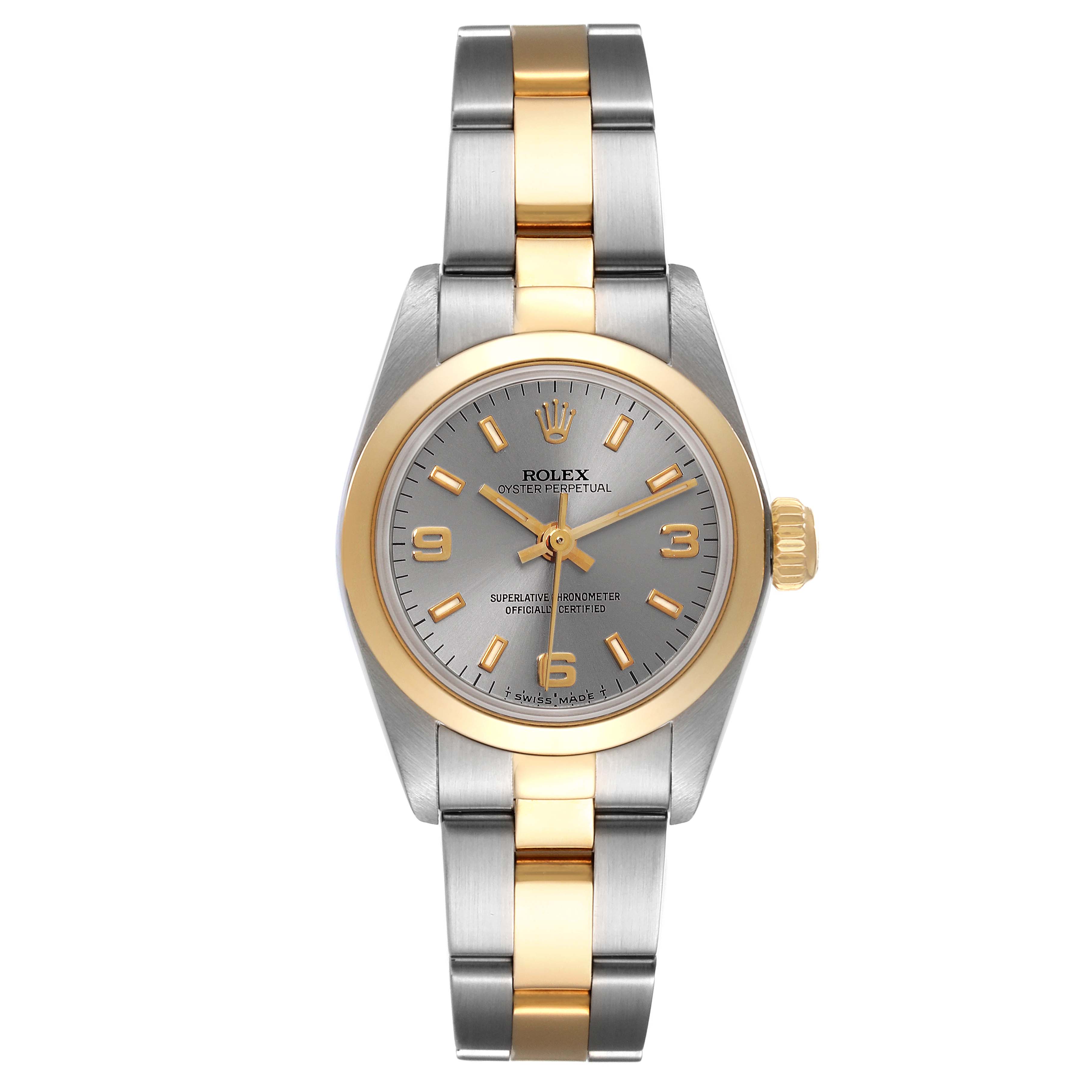 This Rolex Oyster Perpetual 67183 Women's Steel and Gold (two tone) Silver Dial 67183 Women's Steel and Gold (two tone) Silver Dial watch is shown from the front, including the face, bezel, lugs, crown, and bracelet.