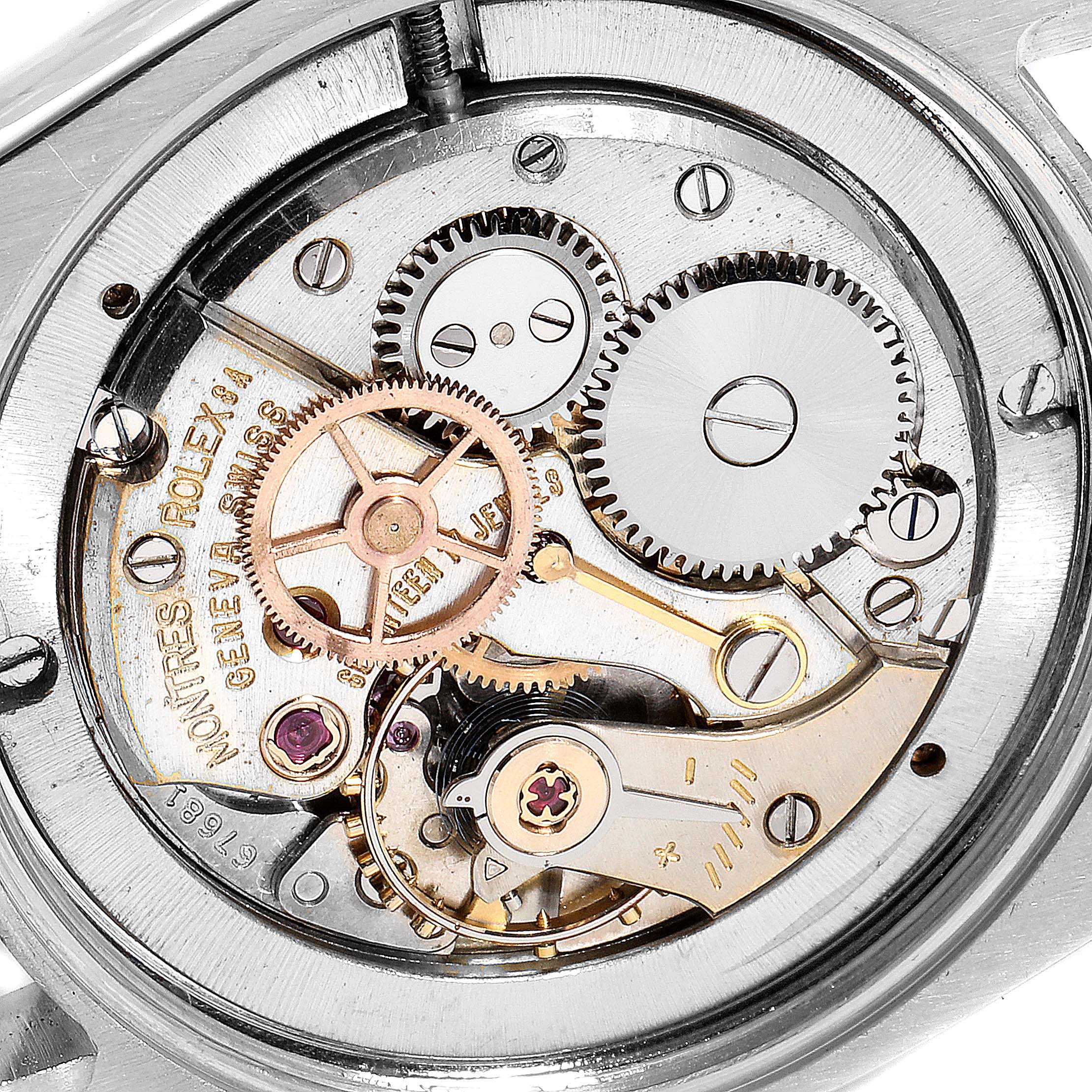 The image shows the inner mechanics of a Rolex Vintage Collection 6694 Men's Stainless Steel Black Dial 6694 Men's Stainless Steel Black Dial model watch from a close-up angle.