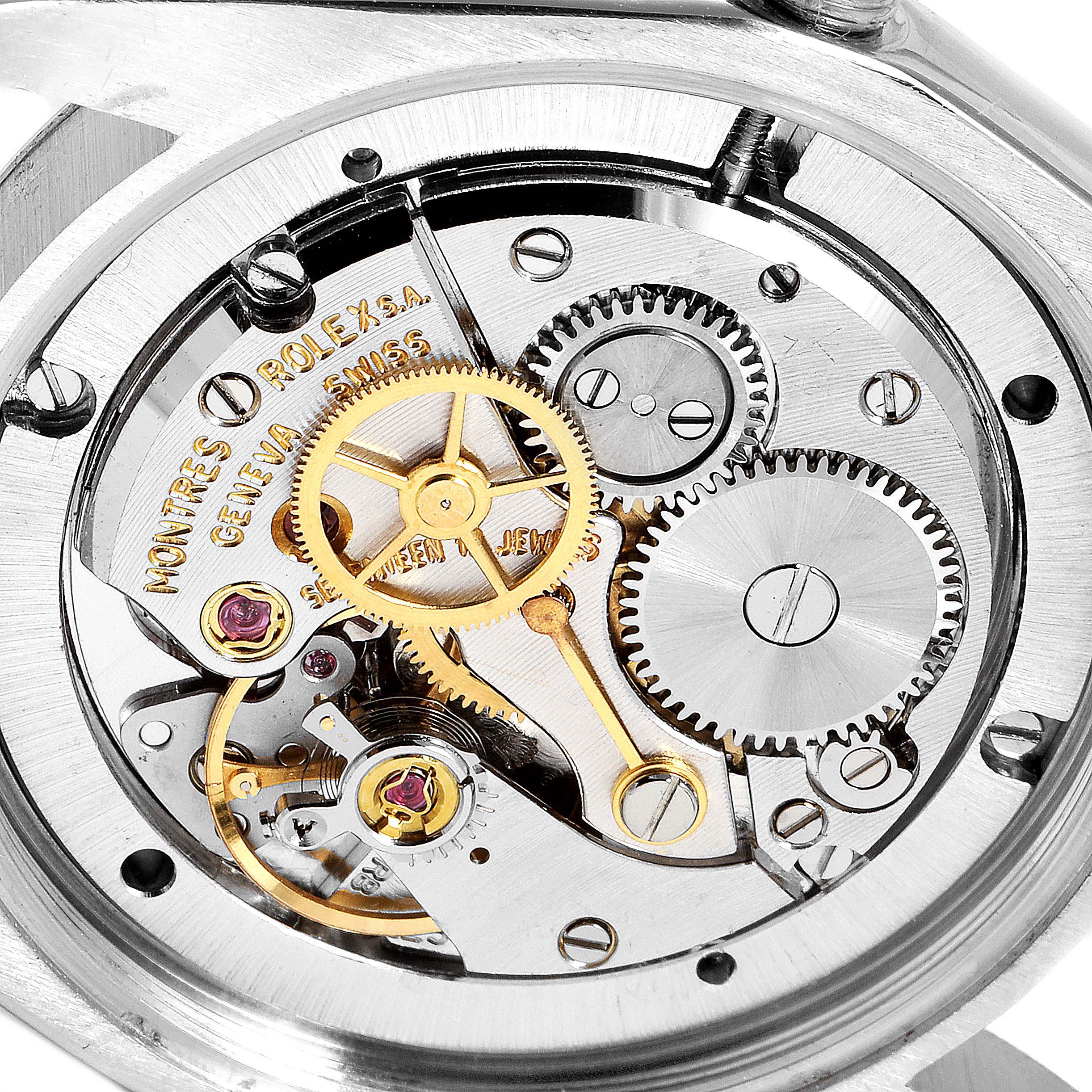 This image shows the intricate inner mechanical components of a Vintage Collection model by Rolex, viewed from the back.