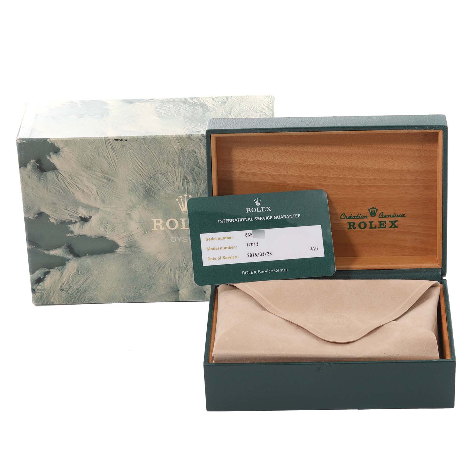 The image shows the packaging, service card, and inner box of a Rolex Oysterquartz 17013 Men
s Steel and Gold (two tone) Silver Dial 17013 Men
s Steel and Gold (two tone) Silver Dial model.