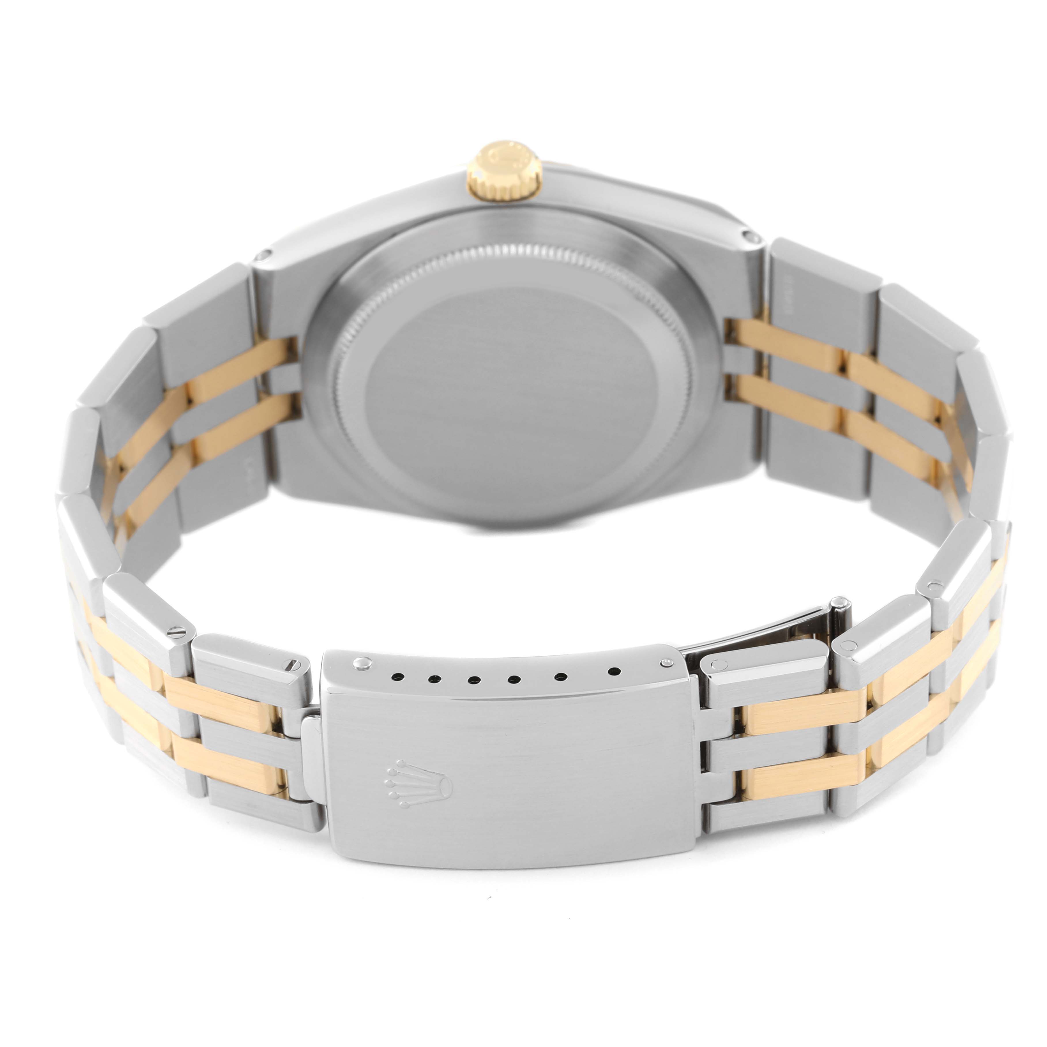 The image shows the back and bracelet of a Rolex Oysterquartz 17013 Men
s Steel and Gold (two tone) Silver Dial 17013 Men
s Steel and Gold (two tone) Silver Dial watch, highlighting the clasp and gold-tone crown.