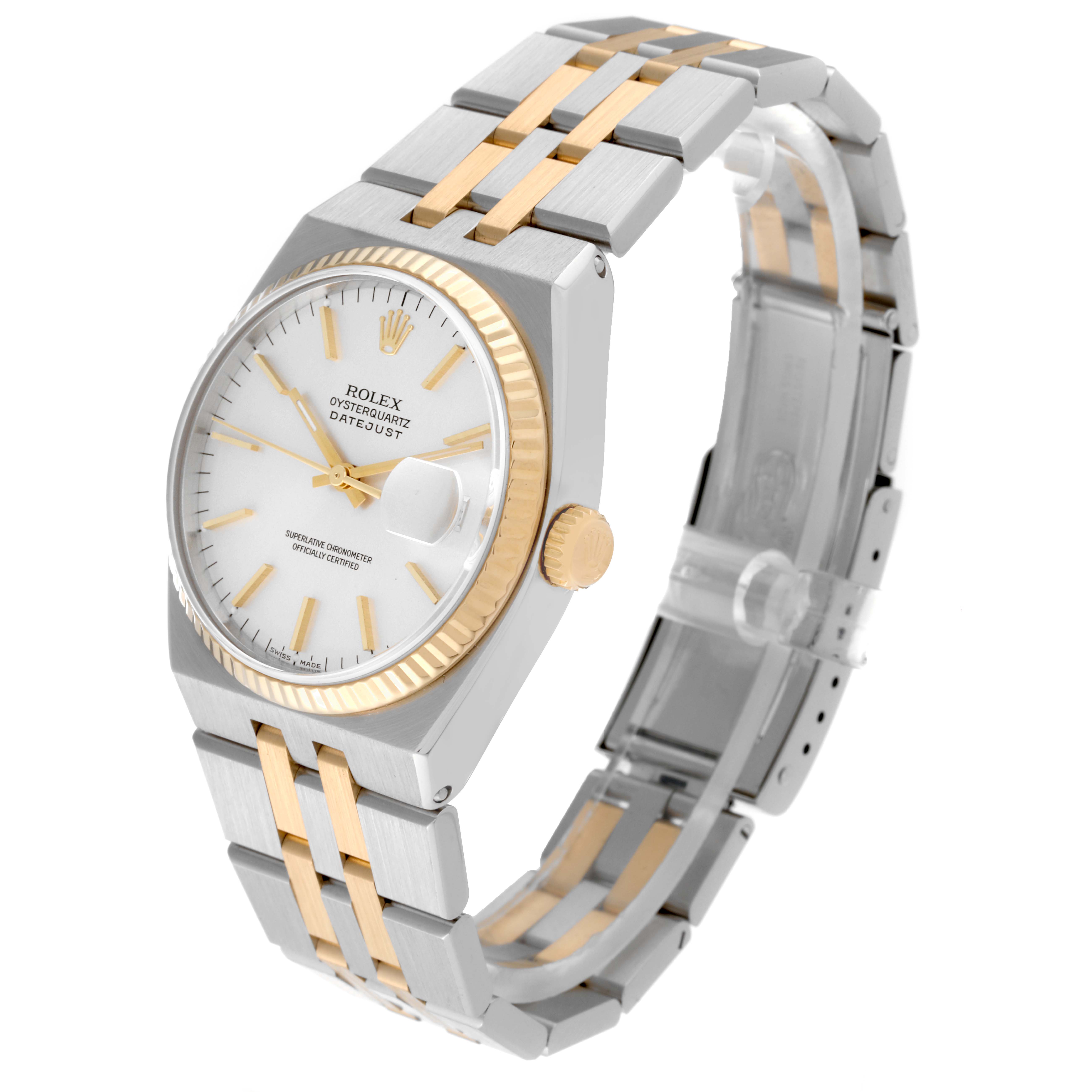 The Rolex Oysterquartz 17013 Men
s Steel and Gold (two tone) Silver Dial 17013 Men
s Steel and Gold (two tone) Silver Dial watch is shown at a three-quarter angle, highlighting its dial, crown, bracelet, and clasp.